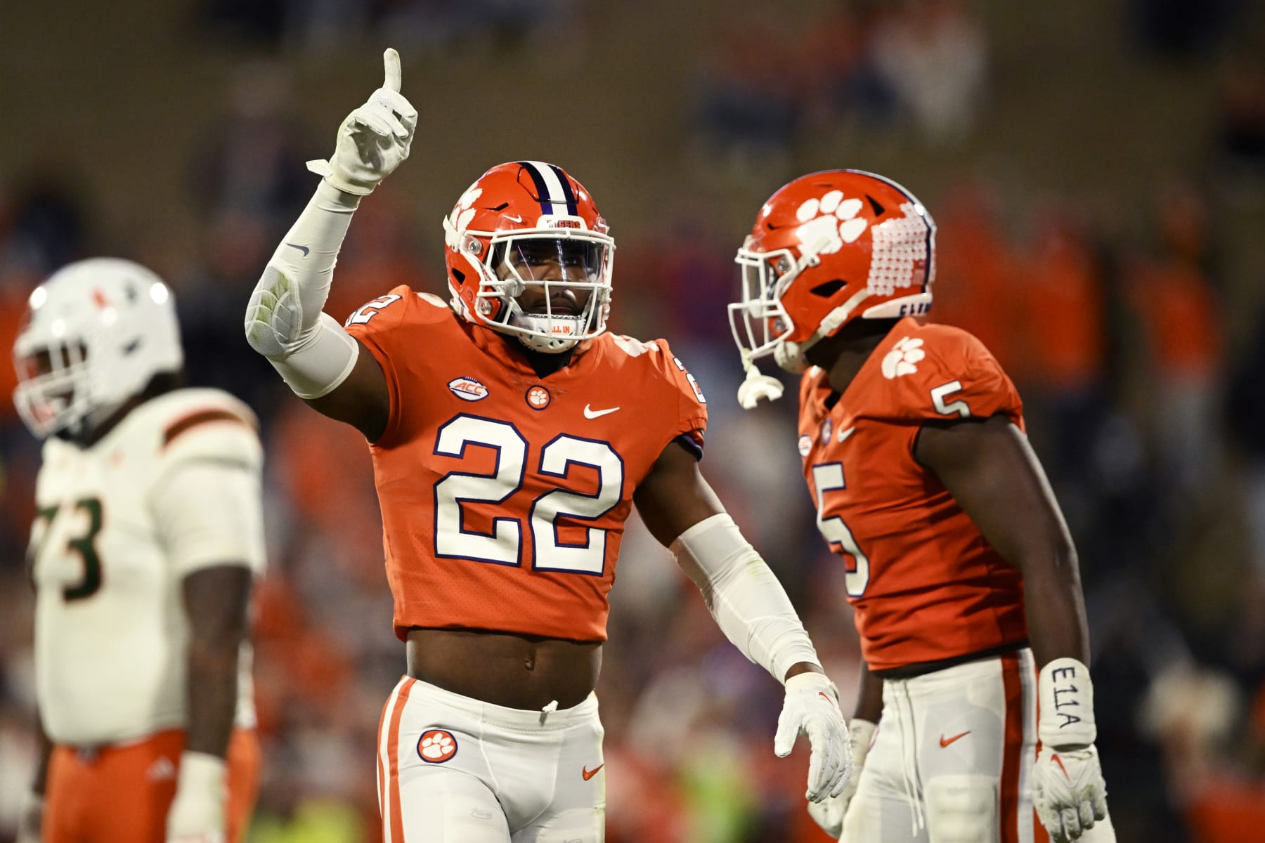 CLEMSON, SOUTH CAROLINA - NOVEMBER 19: Trenton Simpson #22 of the Clemson Tigers celebrates a fourth quarter sack against the Miami Hurricanes at Memorial Stadium on November 19, 2022 in Clemson, South Carolina. (Photo by Eakin Howard/Getty Images)