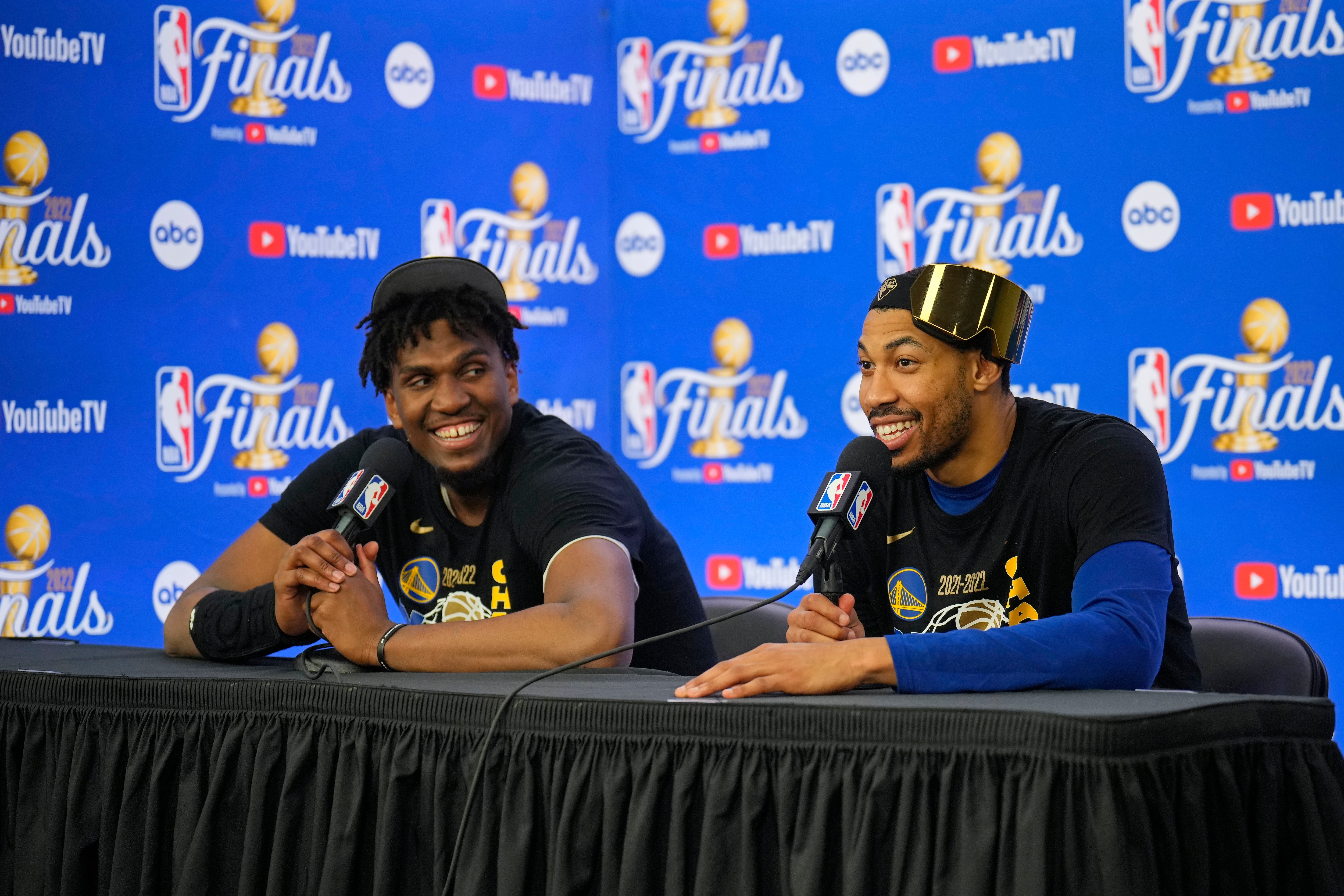BOSTON, MA - JUNE 16: Kevon Looney #5 and Otto Porter Jr. #32 of the Golden State Warriors speaks to the media during a press conference after winning Game Six of the 2022 NBA Finals against the Boston Celtics on June 16, 2022 at TD Garden in Boston, Massachusetts. NOTE TO USER: User expressly acknowledges and agrees that, by downloading and or using this photograph, user is consenting to the terms and conditions of Getty Images License Agreement. Mandatory Copyright Notice: Copyright 2022 NBAE (Photo by Mark Blinch/NBAE via Getty Images)