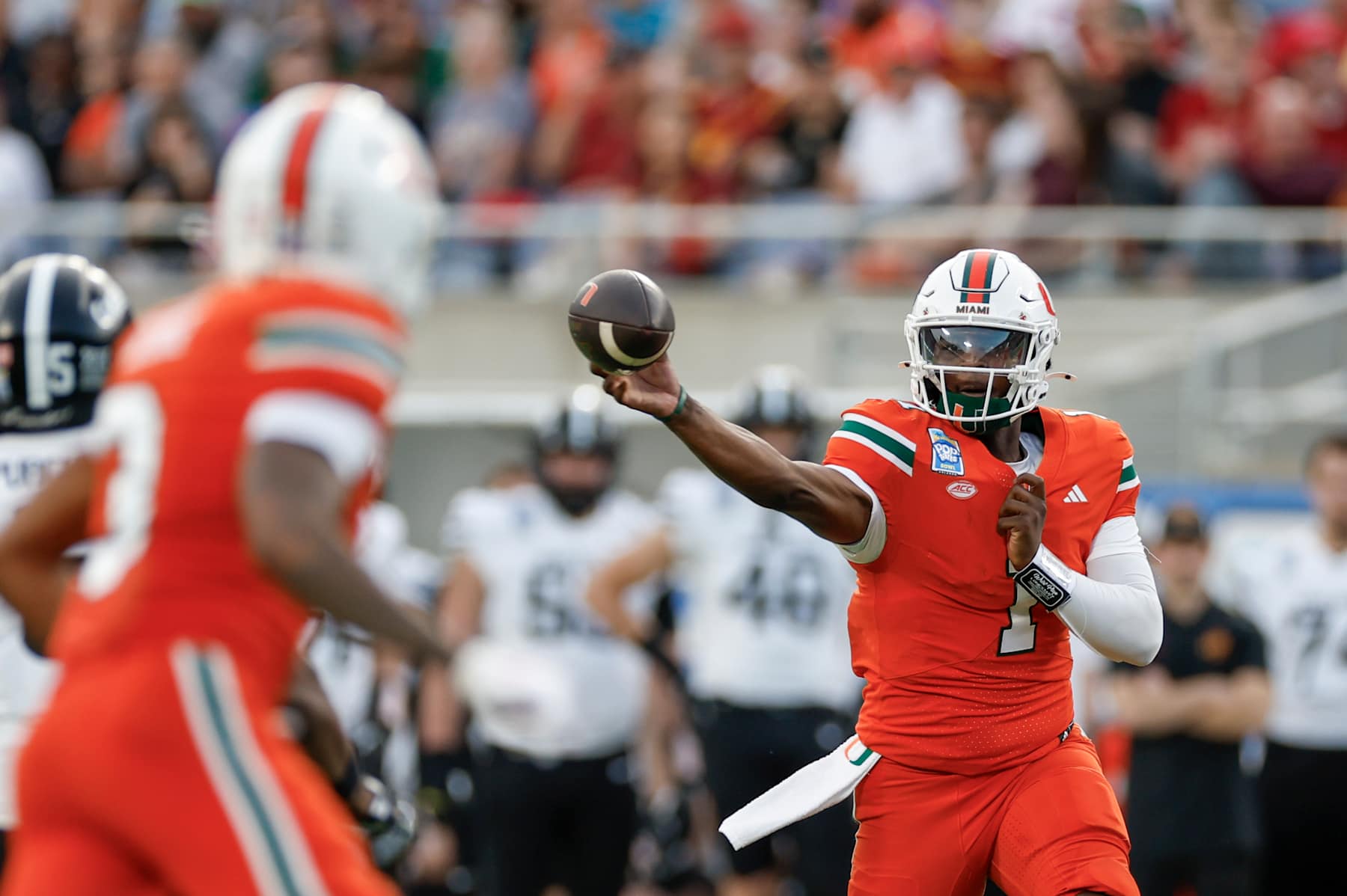 ORLANDO, FL - DECEMBER 28: Miami Hurricanes quarterback Cam Ward (1) throws a pass during the game between the Miami Hurricanes and the Iowa State Cyclones on December 28, 2024 at Camping World Stadium in Orlando, Fl. (Photo by David Rosenblum/Icon Sportswire via Getty Images)