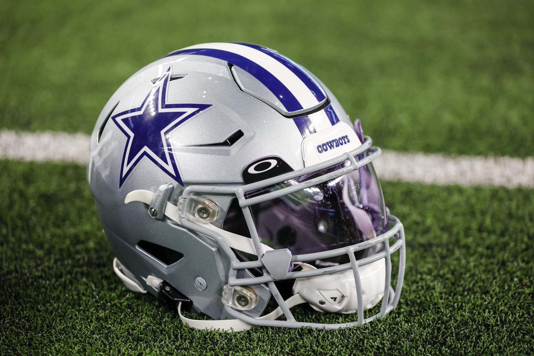 ARLINGTON, TX - DECEMBER 24: A Dallas Cowboys helmet sits on the ground during the game between the Dallas Cowboys and the Philadelphia Eagles on December 24, 2022 at AT&T Stadium in Arlington, Texas. (Photo by Matthew Pearce/Icon Sportswire via Getty Images)