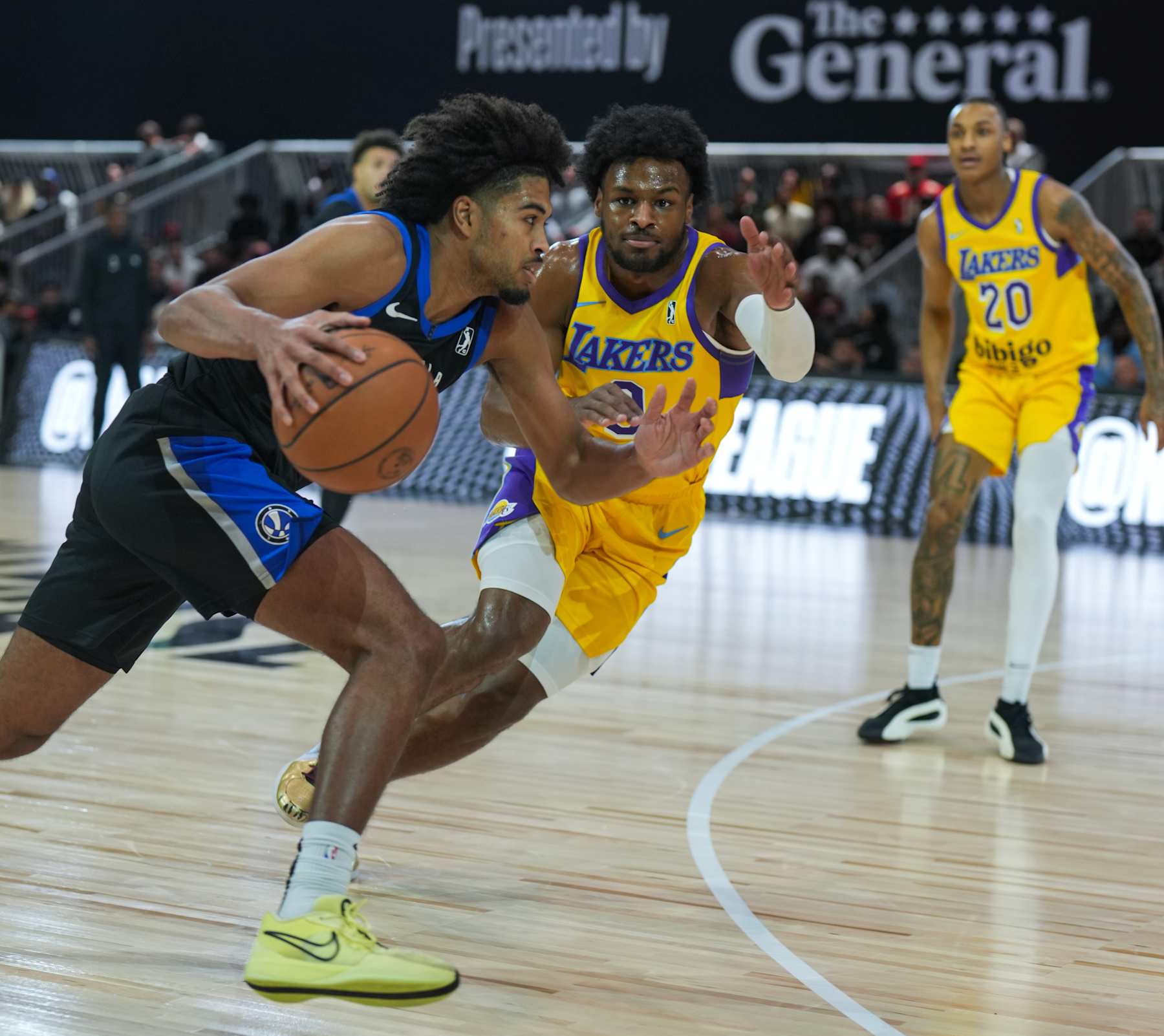 ORLANDO, FL - DECEMBER 21: Bronny James #9 of the South Bay Lakers plays defense against the Osceola Magic during the 2024-25 G League Winter Showcase on December 21, 2024 at Orange Country Convention Center in Orlando, Florida. NOTE TO USER: User expressly acknowledges and agrees that, by downloading and or using this photograph, User is consenting to the terms and conditions of the Getty Images License Agreement. Mandatory Copyright Notice: Copyright 2024 NBAE (Photo by Ryan Stetz/NBAE via Getty Images)