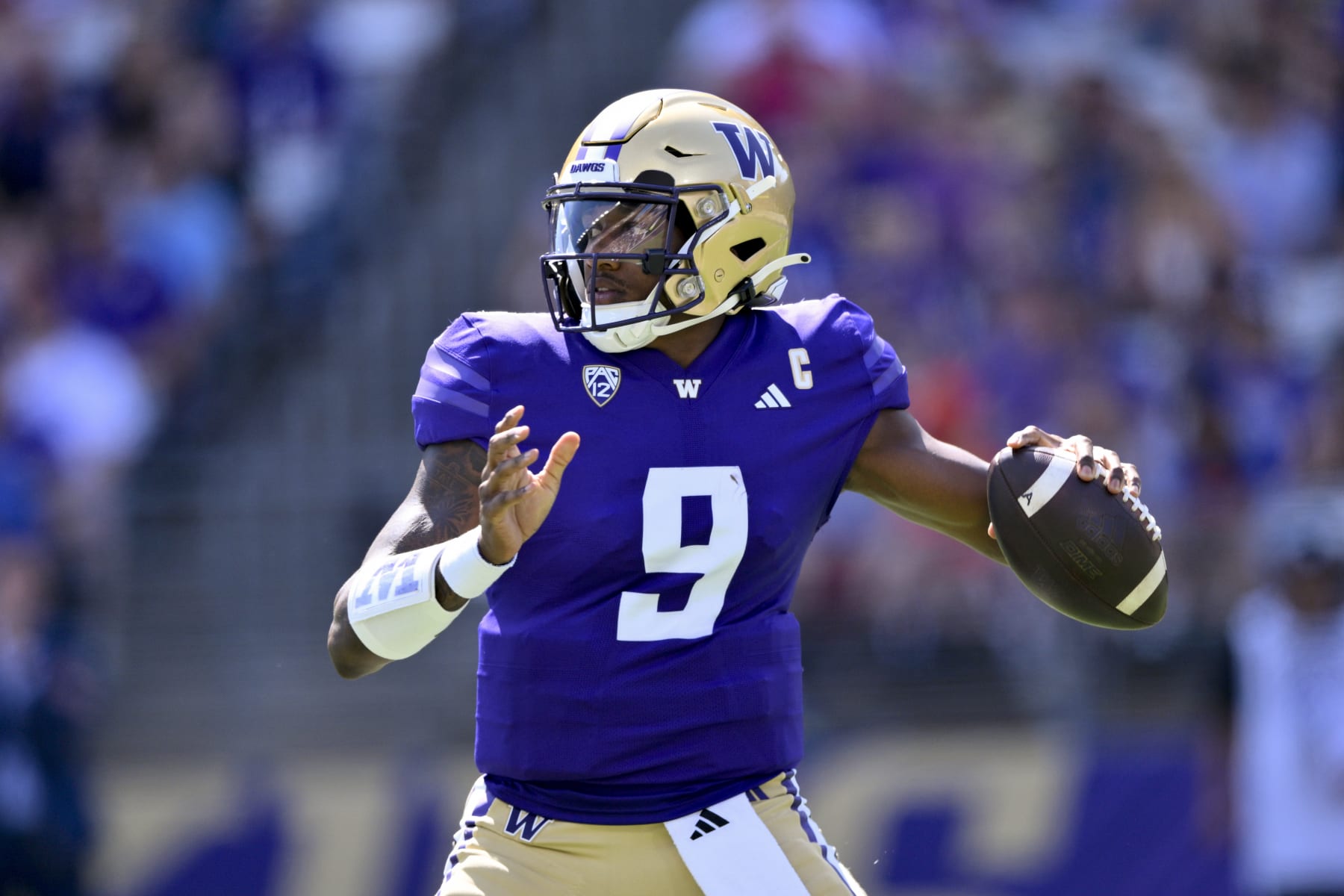 SEATTLE, WASHINGTON - SEPTEMBER 02: Michael Penix Jr. #9 of the Washington Huskies throws the ball during the first quarter against the Boise State Broncos at Husky Stadium on September 02, 2023 in Seattle, Washington. (Photo by Alika Jenner/Getty Images)