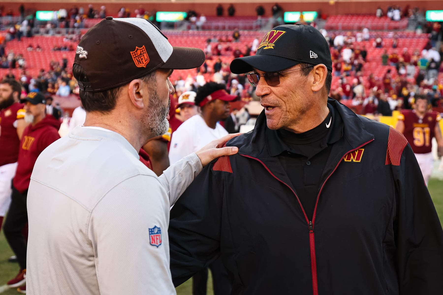 LANDOVER, MD - JANUARY 01: Head coaches Kevin Stefanski of the Cleveland Browns (L) and Ron Rivera of the Washington Commanders (R) interact after the game at FedExField on January 1, 2023 in Landover, Maryland. (Photo by Scott Taetsch/Getty Images)
