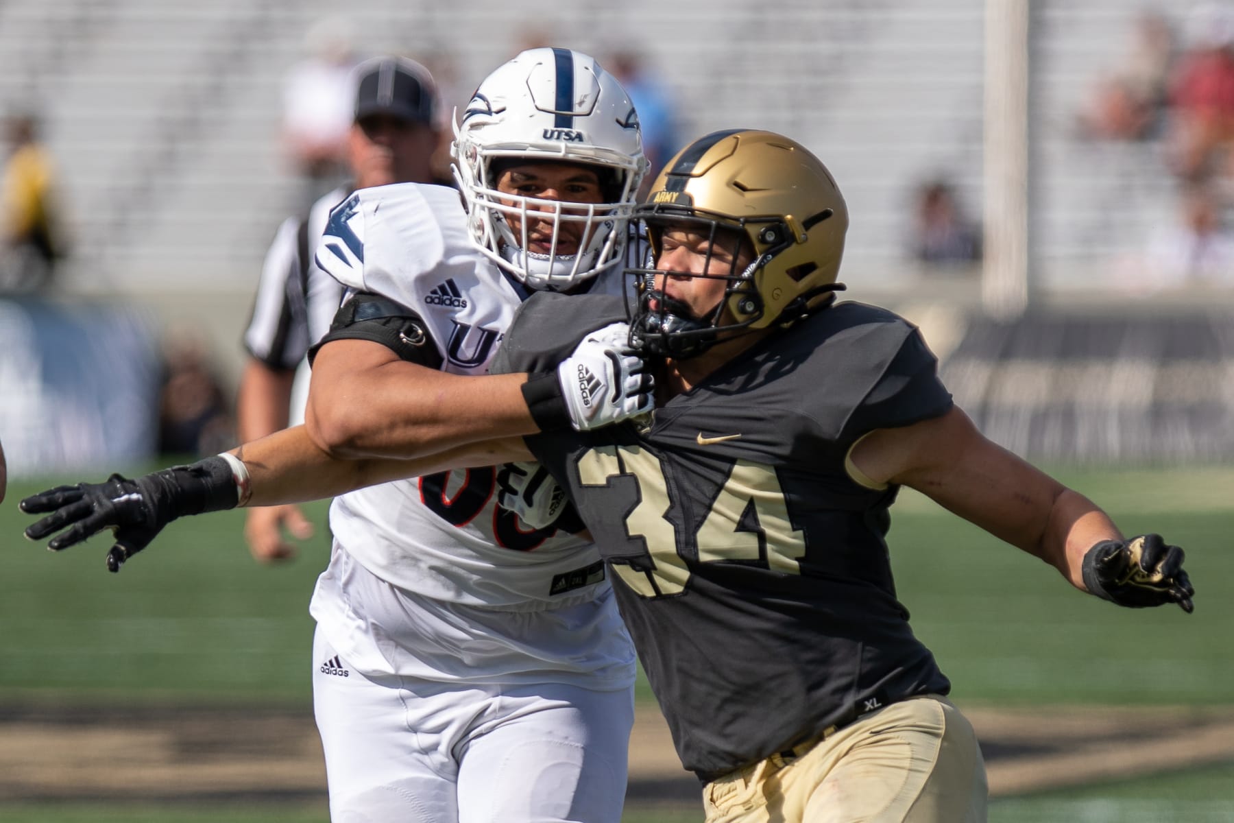 WEST POINT, NY - SEPTEMBER 10: Andre Carter II #34 of the Army Black Knights being blocked during the fourth quarter against the UTSA Roadrunners at Michie Stadium on September 10, 2022 in West Point, New York. (Photo by Edward Diller/Getty Images)