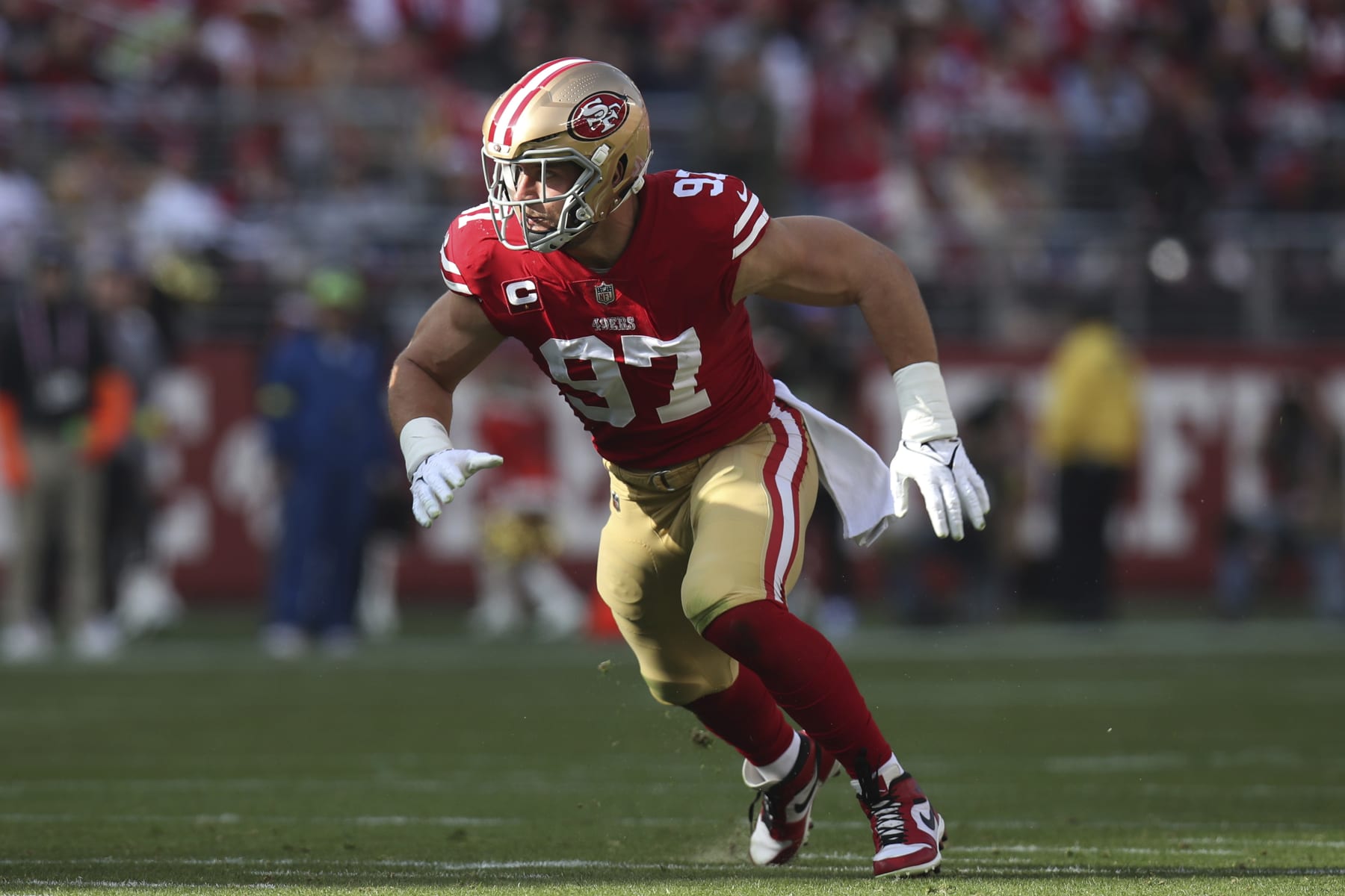 San Francisco 49ers defensive end Nick Bosa (97) rushes after a play during an NFL football game against the Washington Commanders, Sunday, Dec.24, 2022, in Santa Clara, Calif. (AP Photo/Scot Tucker)