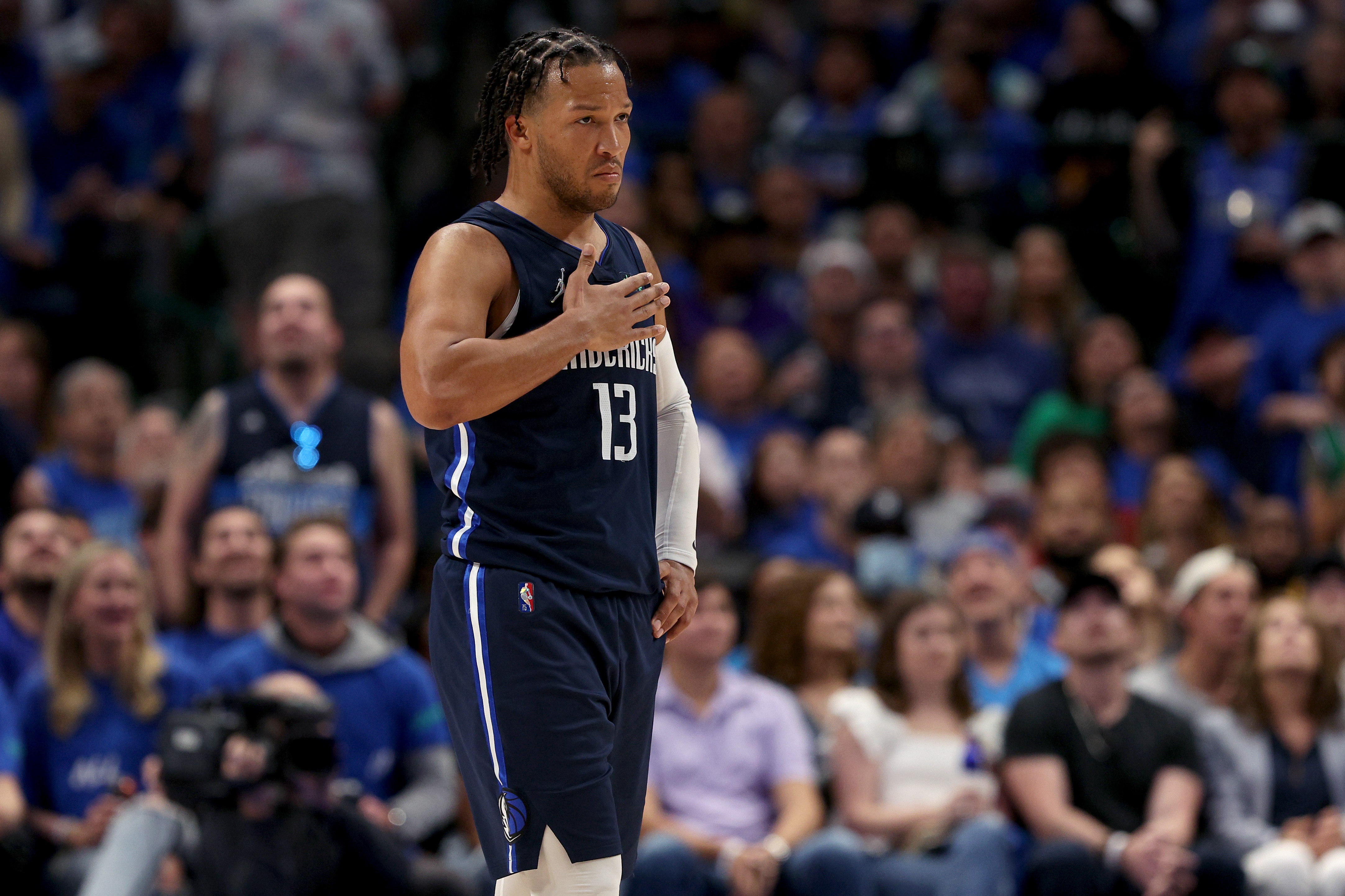 DALLAS, TEXAS - APRIL 16: Jalen Brunson #13 of the Dallas Mavericks reacts against the Utah Jazz in the fourth quarter of Game One of the Western Conference First Round NBA Playoffs at American Airlines Center on April 16, 2022 in Dallas, Texas. NOTE TO USER: User expressly acknowledges and agrees that, by downloading and or using this photograph, User is consenting to the terms and conditions of the Getty Images License Agreement. (Photo by Tom Pennington/Getty Images)