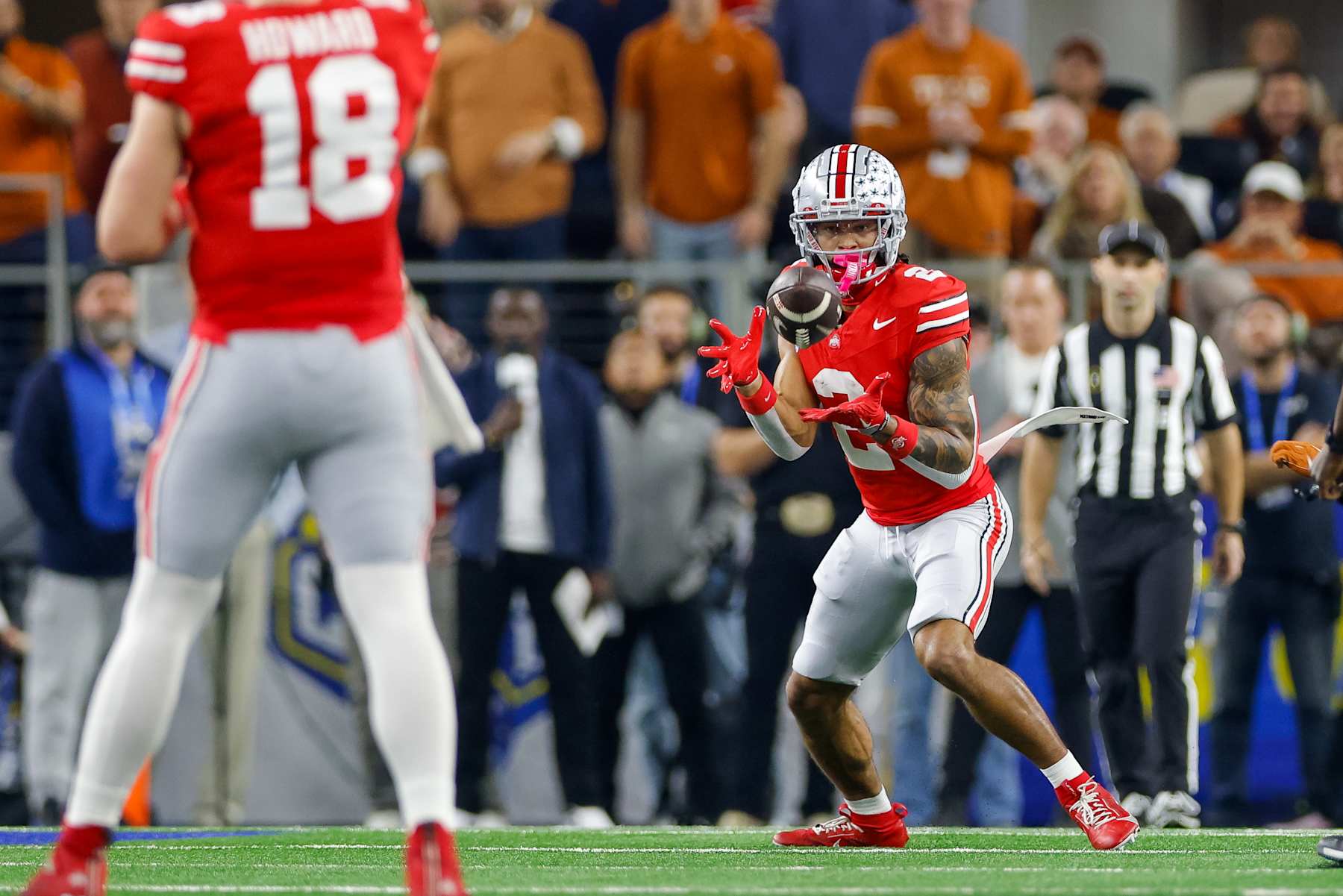 ARLINGTON, TEXAS - JANUARY 10: Emeka Egbuka #2 of the Ohio State Buckeyes catches a pass during the first quarter against the Texas Longhorns during the Goodyear Cotton Bowl at AT&T Stadium on January 10, 2025 in Arlington, Texas. (Photo by CFP/Getty Images)