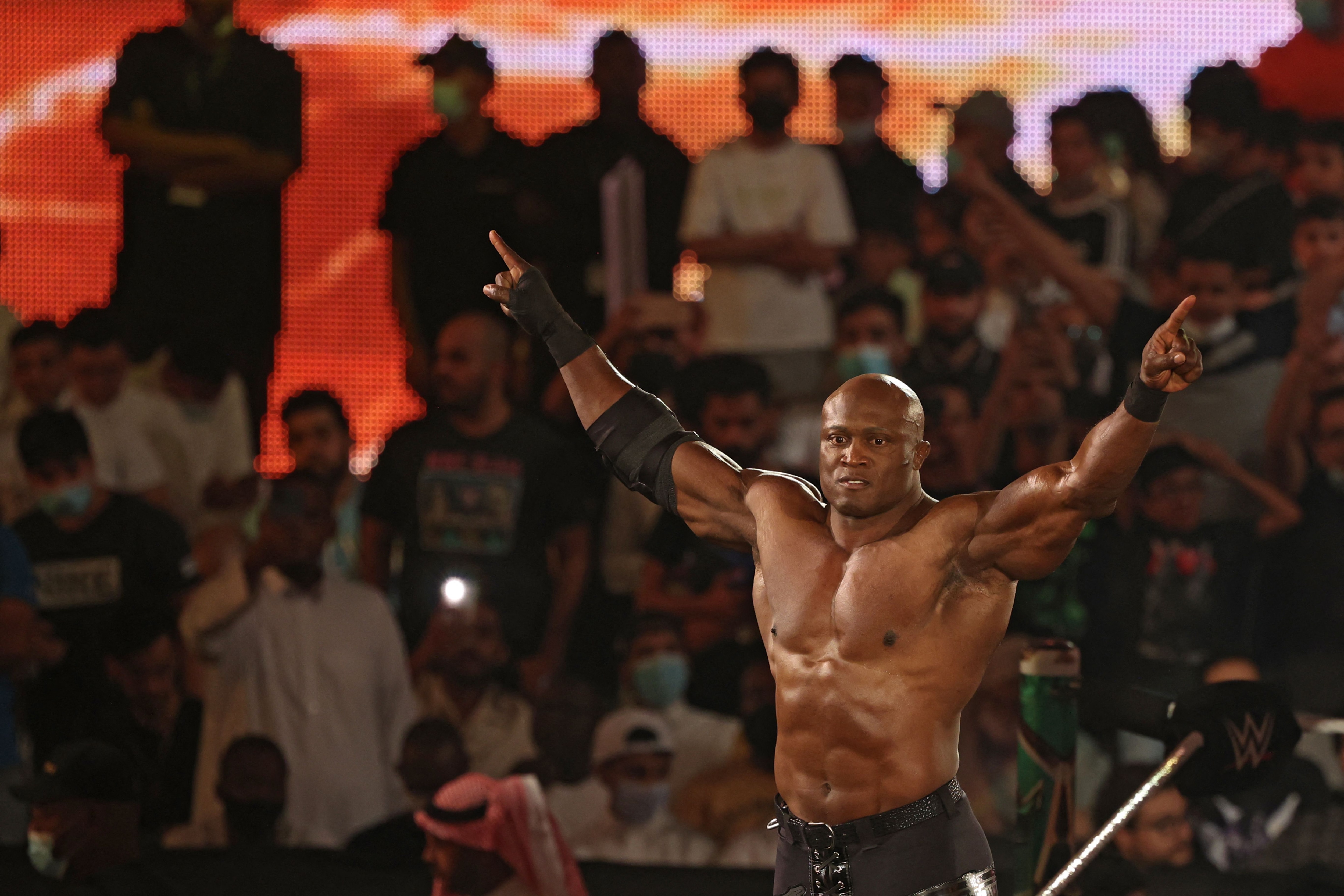 Bobby Lashley greets the crowd ahead of his match during the World Wrestling Entertainment (WWE) Crown Jewel pay-per-view in the Saudi capital Riyadh on October 21, 2021. (Photo by Fayez Nureldine / AFP) (Photo by FAYEZ NURELDINE/AFP via Getty Images)