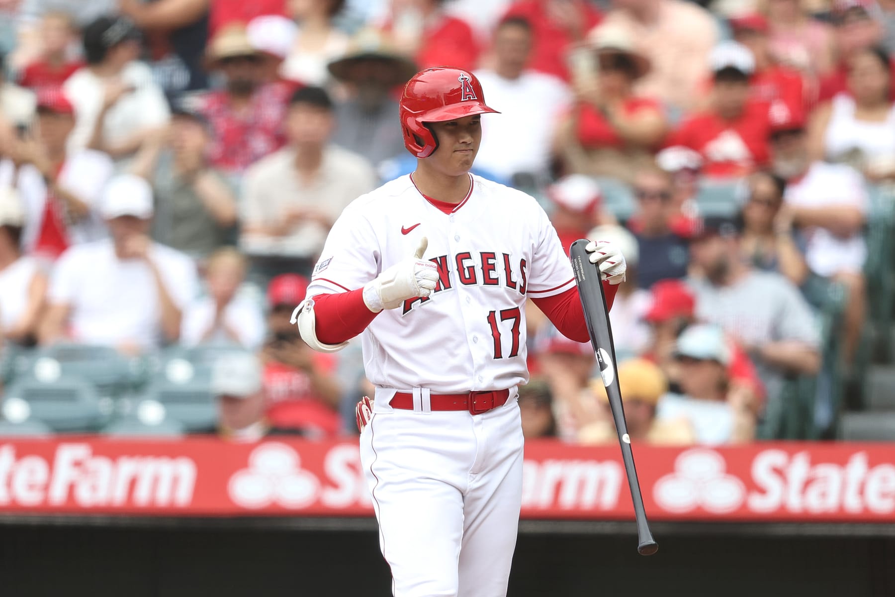 ANAHEIM, CALIFORNIA - JULY 23: Shohei Ohtani #17 of the Los Angeles Angels gives a thumbs up as he walks up to bat against the Pittsburgh Pirates during the first inning at Angel Stadium of Anaheim on July 23, 2023 in Anaheim, California. (Photo by Michael Owens/Getty Images)