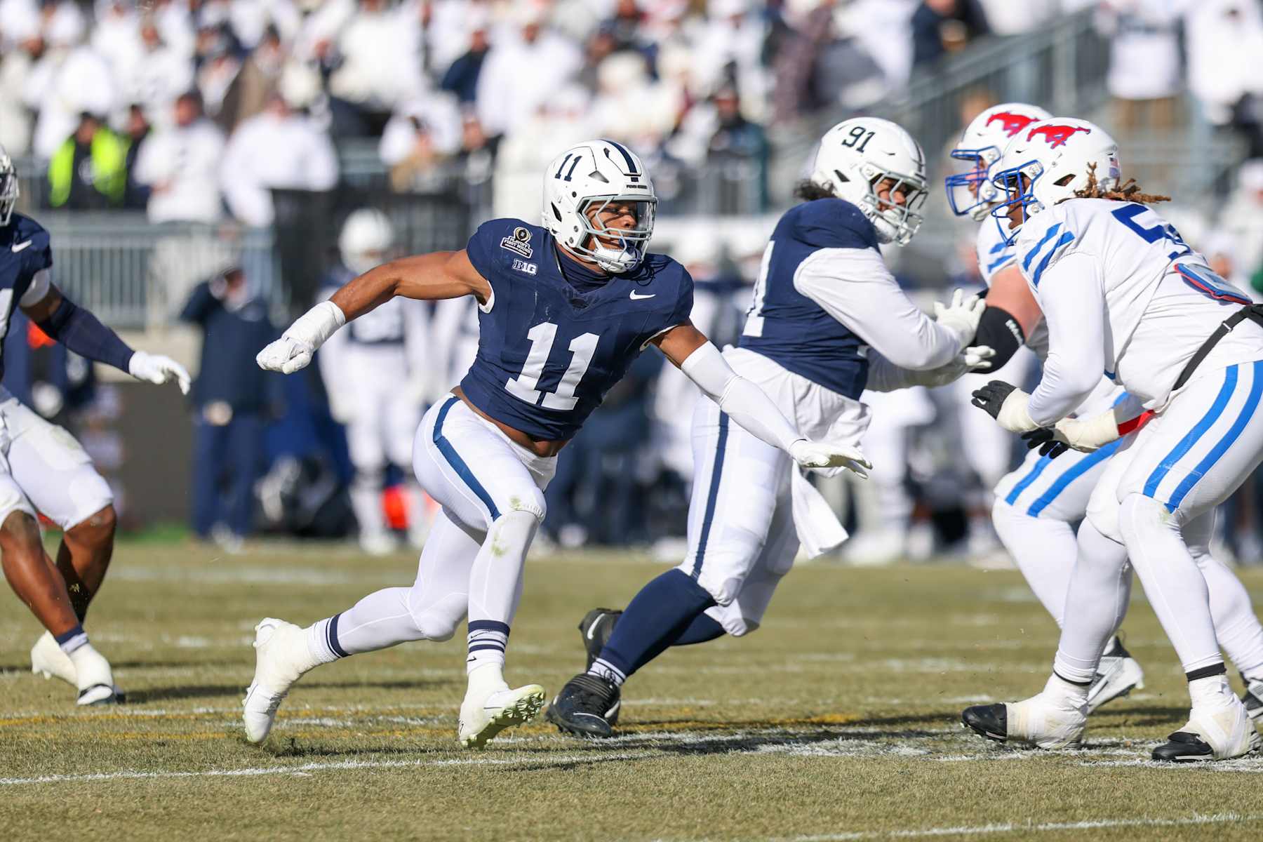 STATE COLLEGE, PA - DECEMBER 21: Abdul Carter #11 of the Penn State Nittany Lions rushes during a game between SMU and Penn State at Beaver Stadium on December 21, 2024 in State College, Pennsylvania. (Photo by Roger Wimmer/ISI Photos/Getty Images)