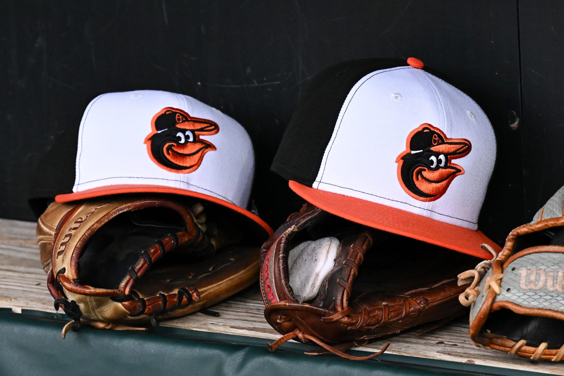 BALTIMORE, MARYLAND - MARCH 30, 2024: A view of Baltimore Orioles hats prior to a game against the Los Angeles Angels at Oriole Park at Camden Yards on March 30, 2024 in Baltimore, Maryland. (Photo by Chris Bernacchi/Diamond Images via Getty Images)