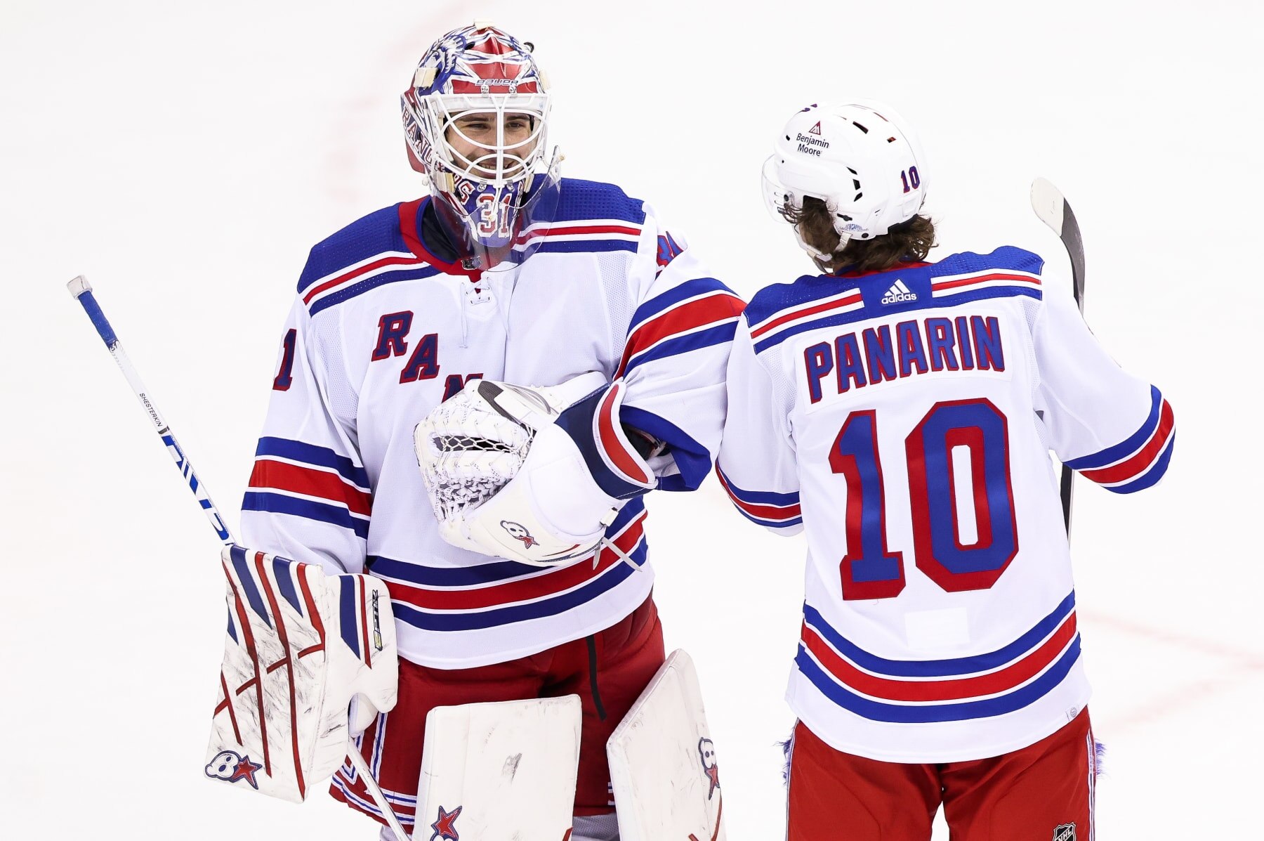 Igor Shesterkin and Artemi Panarin.