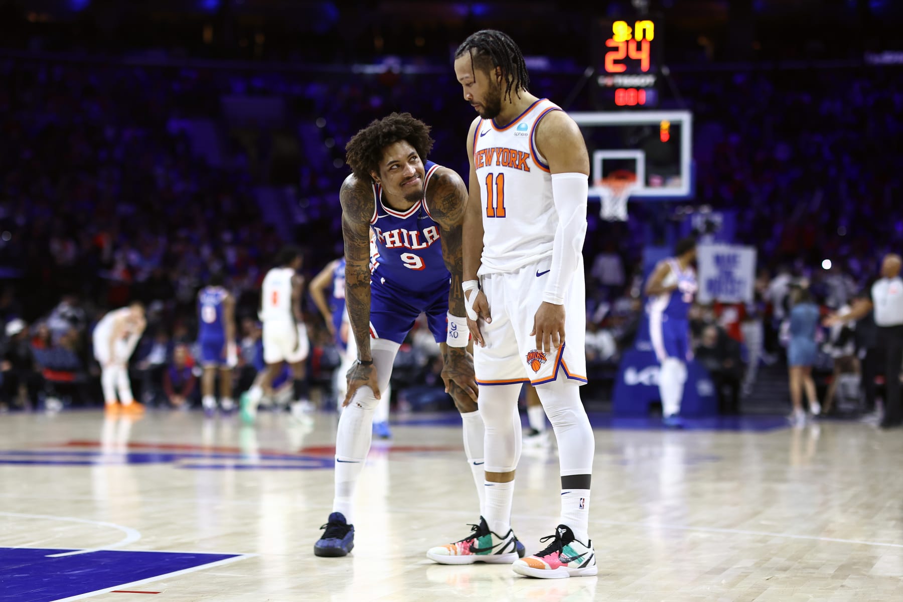 PHILADELPHIA, PENNSYLVANIA - APRIL 25: Kelly Oubre Jr. #9 of the Philadelphia 76ers and Jalen Brunson #11 of the New York Knicks speak during the third quarter of game three of the Eastern Conference First Round Playoffs at the Wells Fargo Center on April 25, 2024 in Philadelphia, Pennsylvania. NOTE TO USER: User expressly acknowledges and agrees that, by downloading and/or using this Photograph, user is consenting to the terms and conditions of the Getty Images License Agreement. (Photo by Tim Nwachukwu/Getty Images) PHILADELPHIA, PENNSYLVANIA - APRIL 25: Kelly Oubre Jr. #9 of the Philadelphia 76ers and Jalen Brunson #11 of the New York Knicks speak during the third quarter of game three of the Eastern Conference First Round Playoffs at the Wells Fargo Center on April 25, 2024 in Philadelphia, Pennsylvania. NOTE TO USER: User expressly acknowledges and agrees that, by downloading and/or using this Photograph, user is consenting to the terms and conditions of the Getty Images License Agreement. (Photo by Tim Nwachukwu/Getty Images)