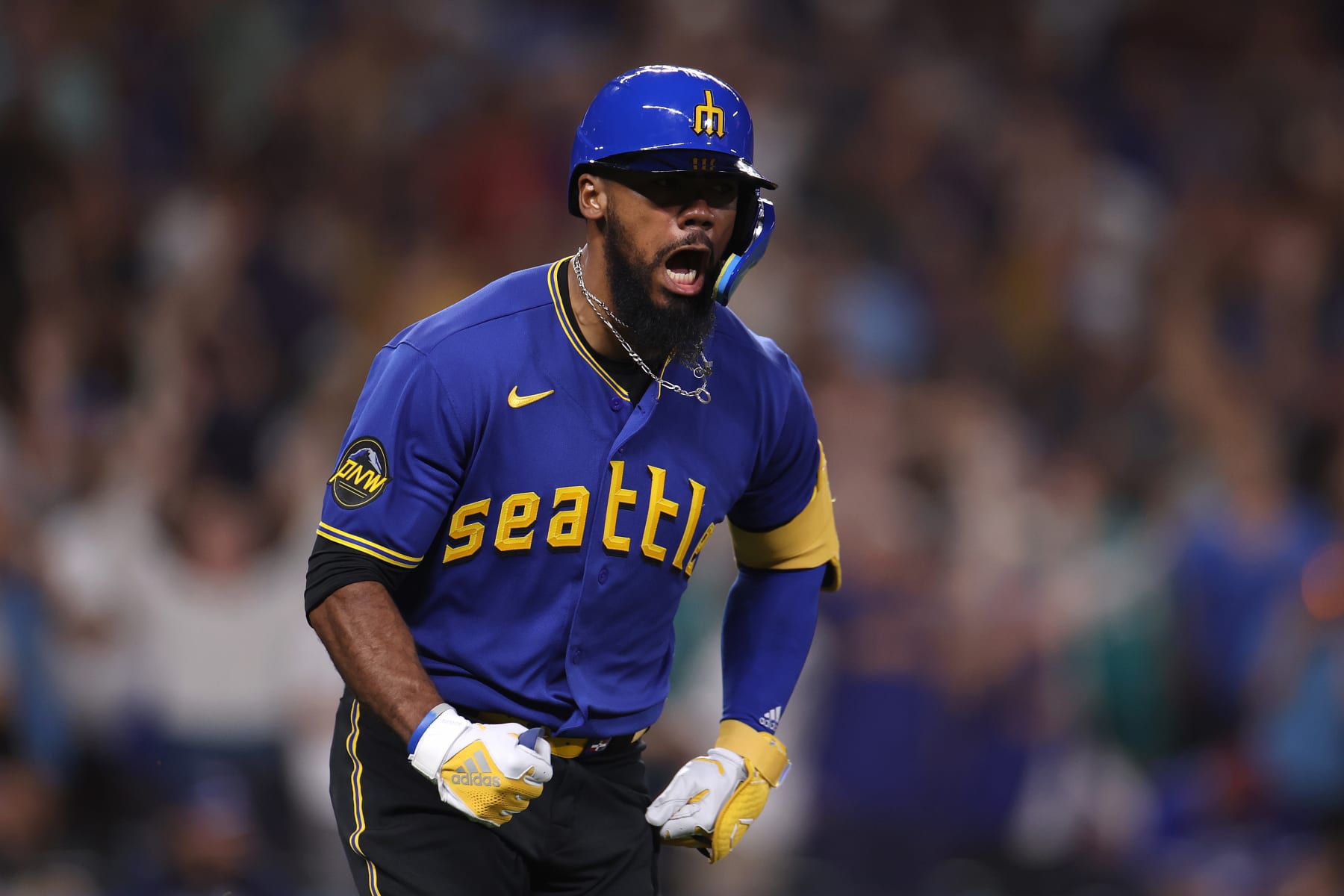 SEATTLE, WASHINGTON - JULY 21: Teoscar Hernandez #35 of the Seattle Mariners celebrates his walk-off single against the Toronto Blue Jays during the ninth inning at T-Mobile Park on July 21, 2023 in Seattle, Washington. (Photo by Steph Chambers/Getty Images)