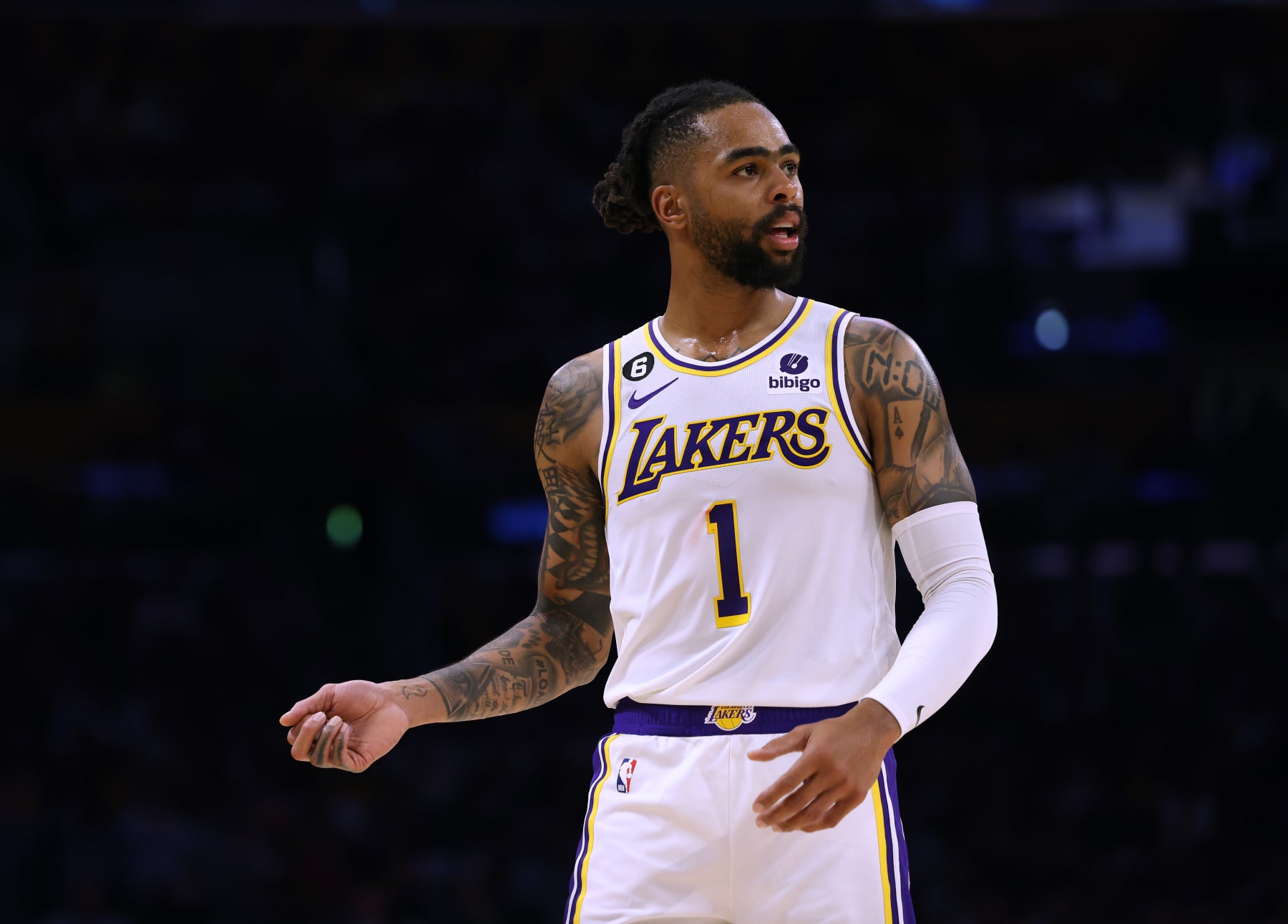 LOS ANGELES, CALIFORNIA - APRIL 22: D'Angelo Russell #1 of the Los Angeles Lakers reacts to a Lakers foul during a 111-101 Lakers win over the Memphis Grizzlies in Game Three of the Western Conference First Round Playoffs at Crypto.com Arena on April 22, 2023 in Los Angeles, California. NOTE TO USER: User expressly acknowledges and agrees that, by downloading and or using this photograph, User is consenting to the terms and conditions of the Getty Images License Agreement. (Photo by Harry How/Getty Images)