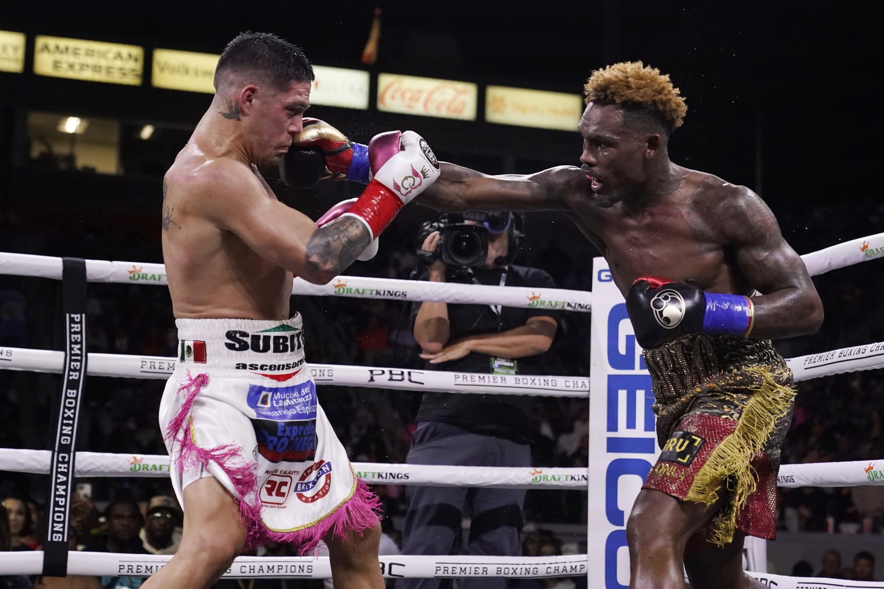 Jermell Charlo, right, hits Brian Castano with a right during a super welterweight boxing title bout Saturday, May 14, 2022, in Carson, Calif. (AP Photo/Marcio Jose Sanchez)