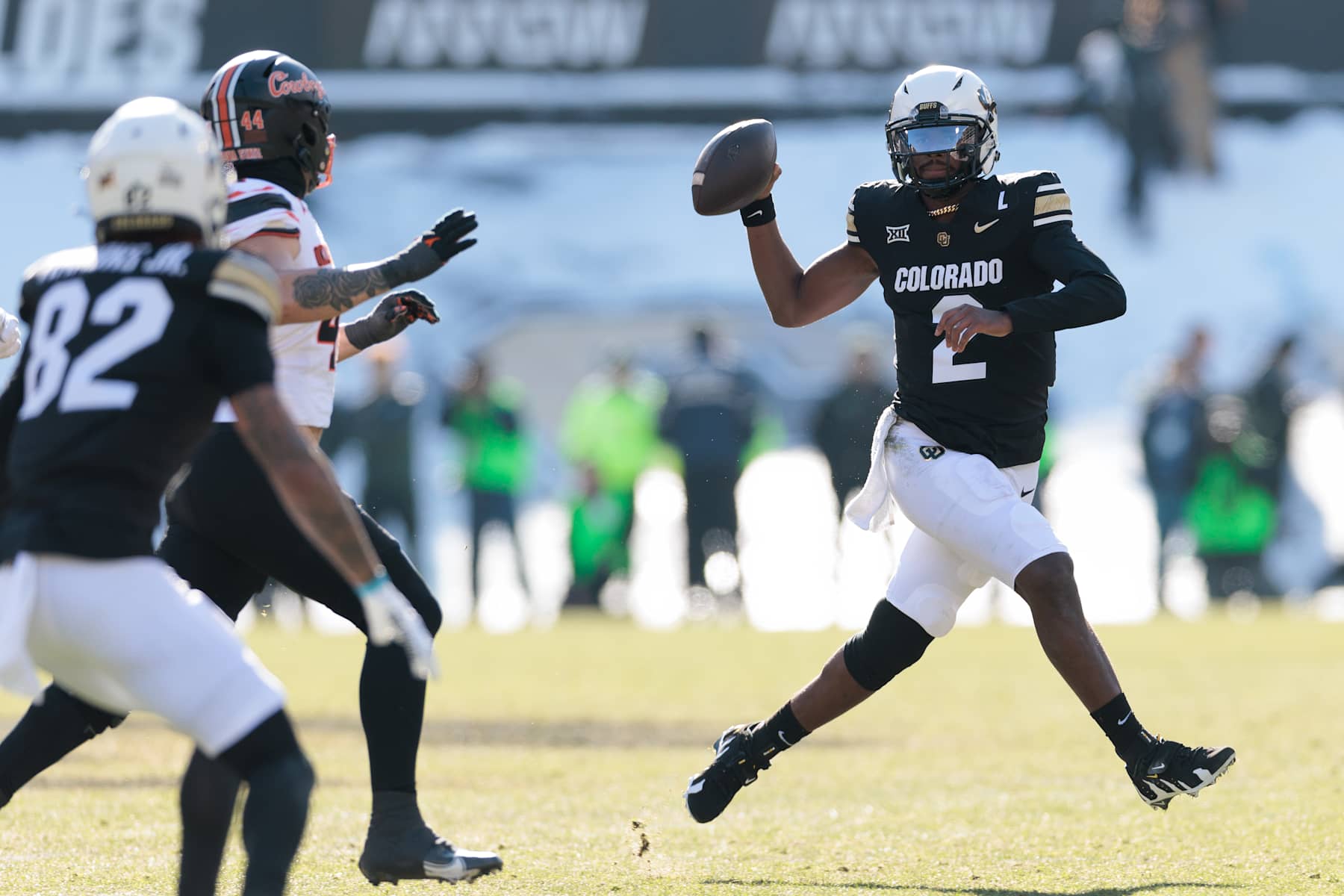 BOULDER, COLORADO - NOVEMBER 29: Shedeur Sanders #2 of the Colorado Buffaloes runs with the ball during the first half against the Oklahoma State Cowboys at Folsom Field on November 29, 2024 in Boulder, Colorado. (Photo by Andrew Wevers/Getty Images)