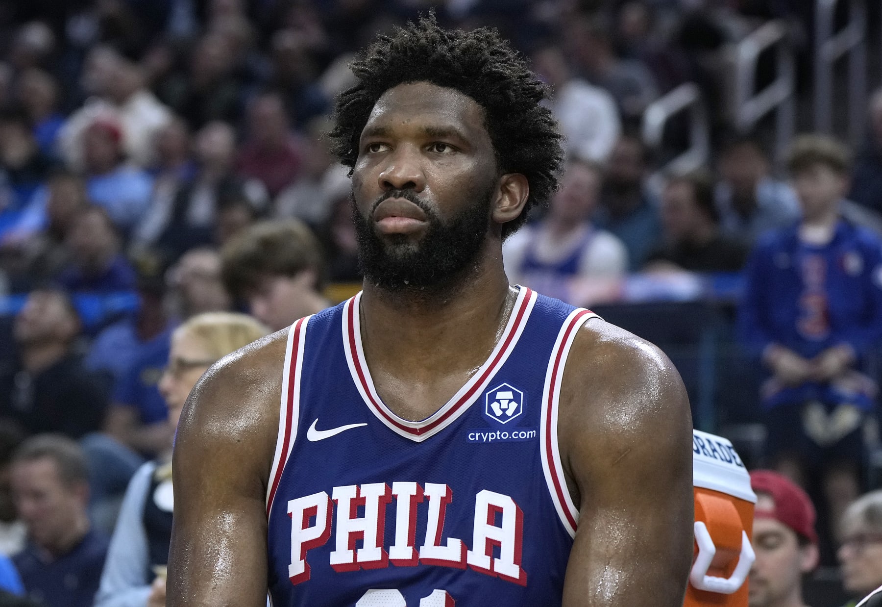 SAN FRANCISCO, CALIFORNIA - JANUARY 30: Joel Embiid #21 of the Philadelphia 76ers looks on from the bench against the Golden State Warriors during the fourth quarter of an NBA basketball game at Chase Center on January 30, 2024 in San Francisco, California. NOTE TO USER: User expressly acknowledges and agrees that, by downloading and or using this photograph, User is consenting to the terms and conditions of the Getty Images License Agreement. (Photo by Thearon W. Henderson/Getty Images)