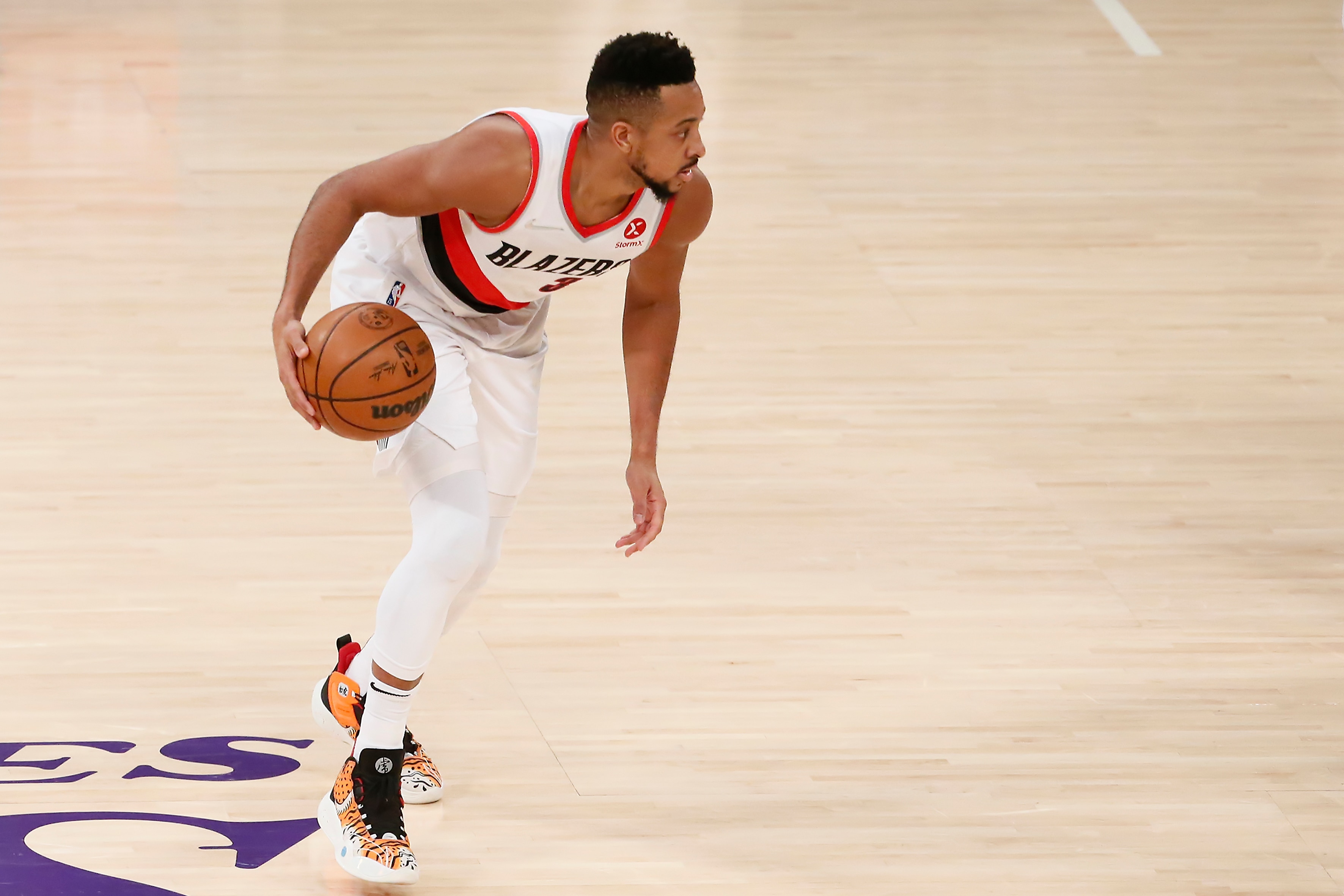 LOS ANGELES, CA - FEBRUARY 2: CJ McCollum #3 of the Portland Trail Blazers dribbles the ball during a game at the Crypto.com Arena on February 2, 2022 in Los Angeles, California. NOTE TO USER: User expressly acknowledges and agrees that, by downloading and or using this photograph, User is consenting to the terms and conditions of the Getty Images License Agreement. Mandatory Credit: 2022 NBAE (Photo by Chris Elise/NBAE via Getty Images)