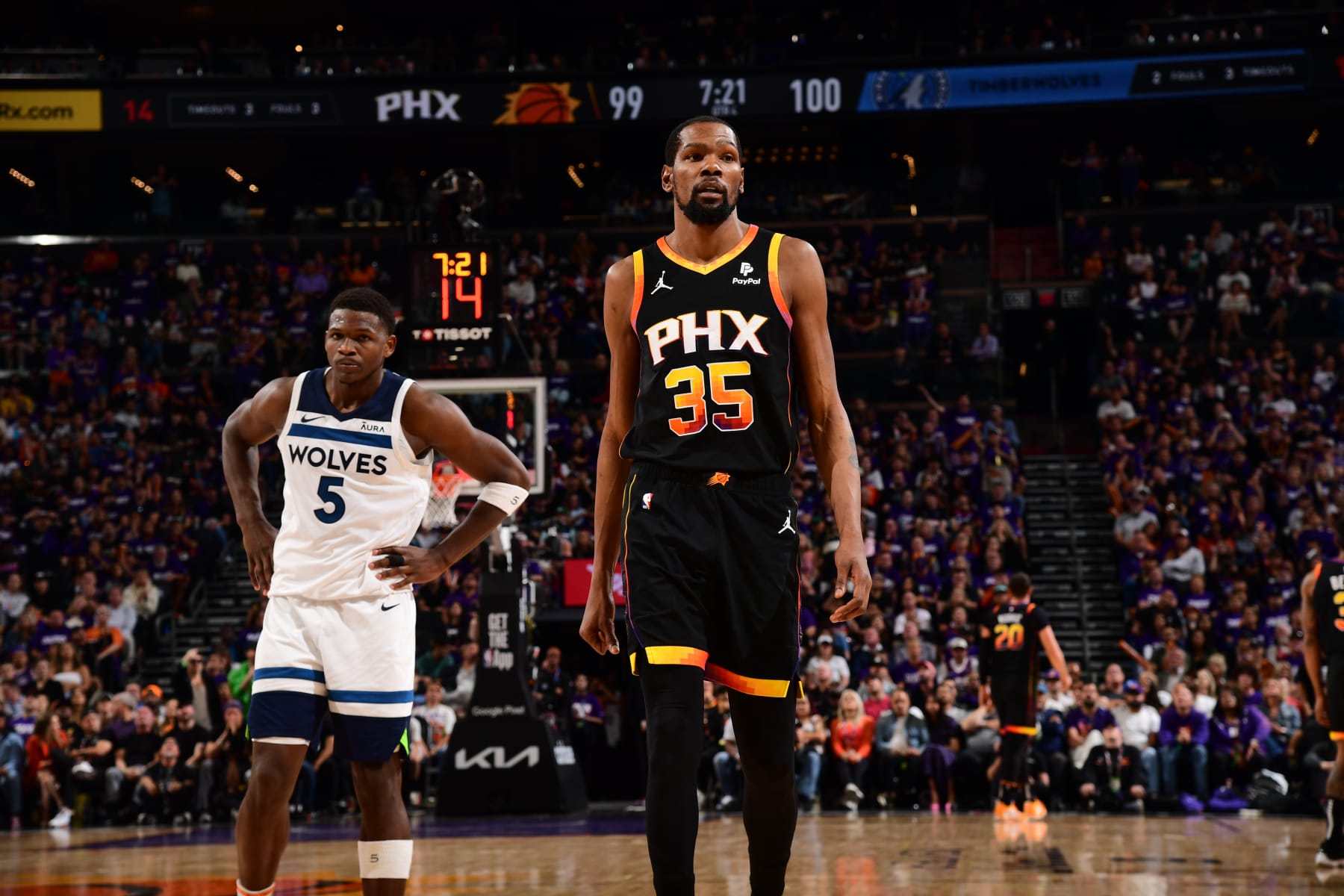PHOENIX, AZ - APRIL  28: Kevin Durant #35 of the Phoenix Suns and Anthony Edwards #5 of the Minnesota Timberwolves look on during the game during Round 1 Game 4 of the 2024 NBA Playoffs on April 28, 2024 at Footprint Center in Phoenix, Arizona. NOTE TO USER: User expressly acknowledges and agrees that, by downloading and or using this photograph, user is consenting to the terms and conditions of the Getty Images License Agreement. Mandatory Copyright Notice: Copyright 2024 NBAE (Photo by Kate Frese/NBAE via Getty Images)
