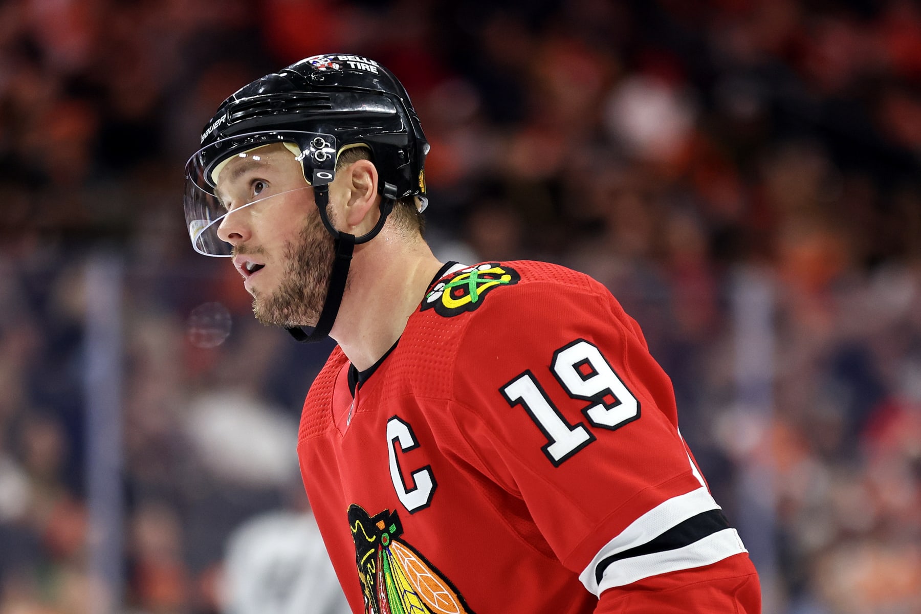 PHILADELPHIA, PENNSYLVANIA - JANUARY 19: Jonathan Toews #19 of the Chicago Blackhawks looks on after scoring during the second period against the Philadelphia Flyers at Wells Fargo Center on January 19, 2023 in Philadelphia, Pennsylvania. (Photo by Tim Nwachukwu/Getty Images)