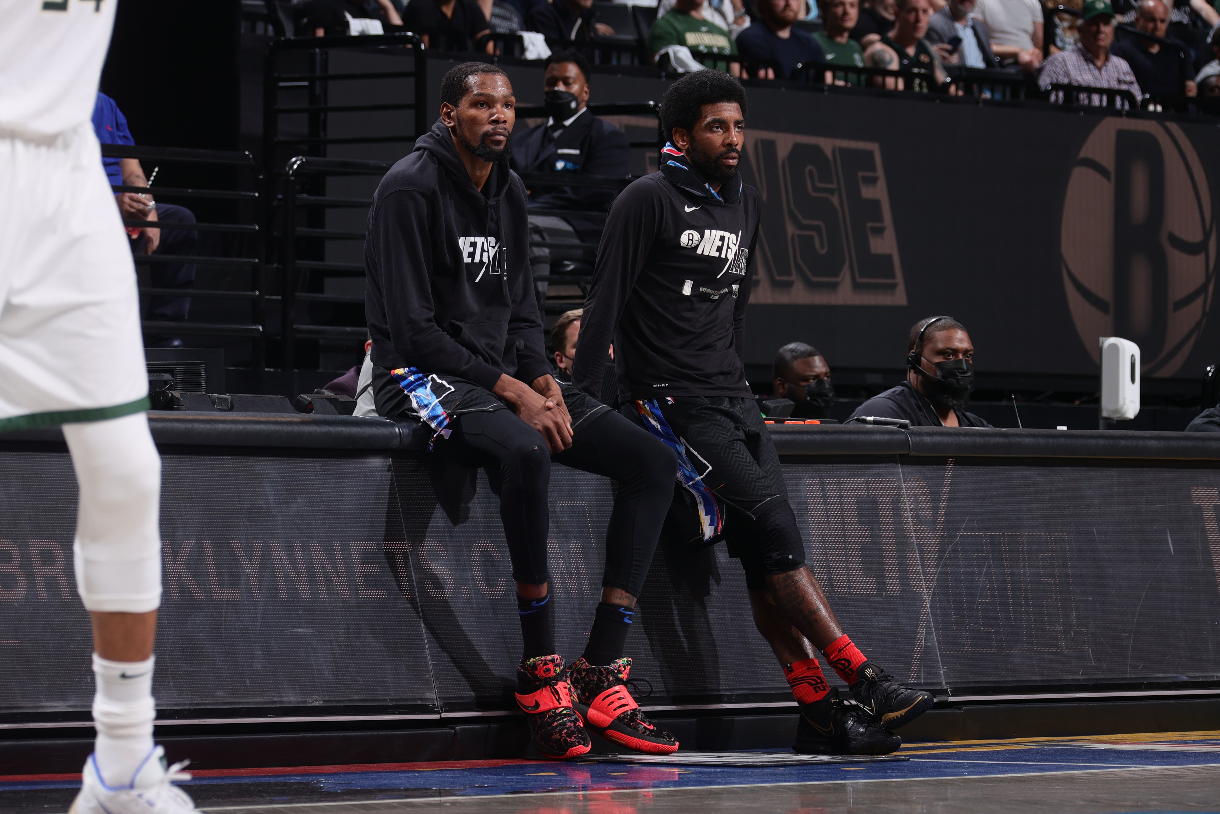 BROOKLYN, NY - JUNE 7: Kevin Durant #7 of the Brooklyn Nets and Kyrie Irving #11 of the Brooklyn Nets looks on during Round 2, Game 2 of the 2021 NBA Playoffs on June 7, 2021 at Barclays Center in Brooklyn, New York. NOTE TO USER: User expressly acknowledges and agrees that, by downloading and or using this Photograph, user is consenting to the terms and conditions of the Getty Images License Agreement. Mandatory Copyright Notice: Copyright 2021 NBAE (Photo by Nathaniel S. Butler/NBAE via Getty Images)