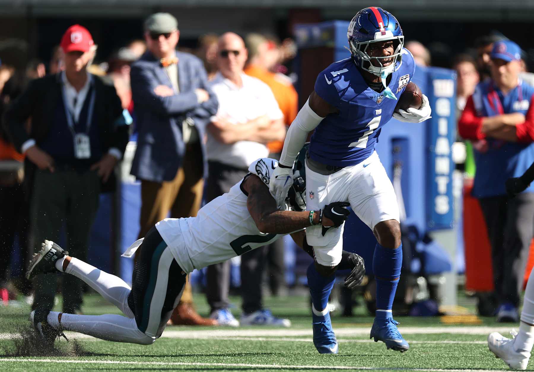 EAST RUTHERFORD, NEW JERSEY - OCTOBER 20: Malik Nabers #1 of the New York Giants runs the ball against the Philadelphia Eagles during the first half at MetLife Stadium on October 20, 2024 in East Rutherford, New Jersey. (Photo by Al Bello/Getty Images)
