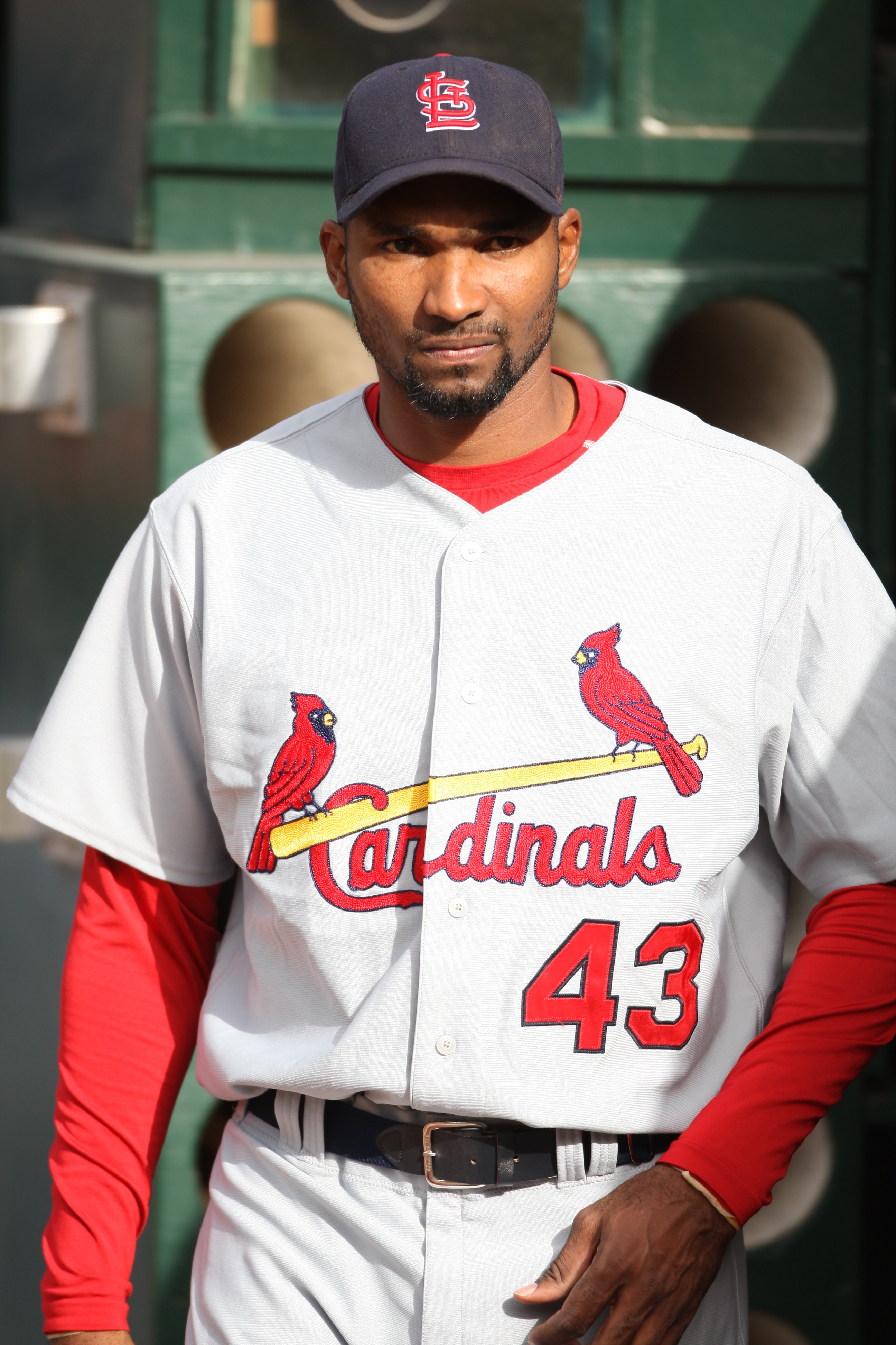 OAKLAND, CA - JUNE 16:  Juan Encarnacion of the St. Louis Cardinals gets ready in the dugout before the game against the Oakland Athletics at the McAfee Coliseum in Oakland, California on June 16, 2007.  The Cardinals defeated the Athletics 15-6.  (Photo by Brad Mangin/MLB Photos via Getty Images) 
