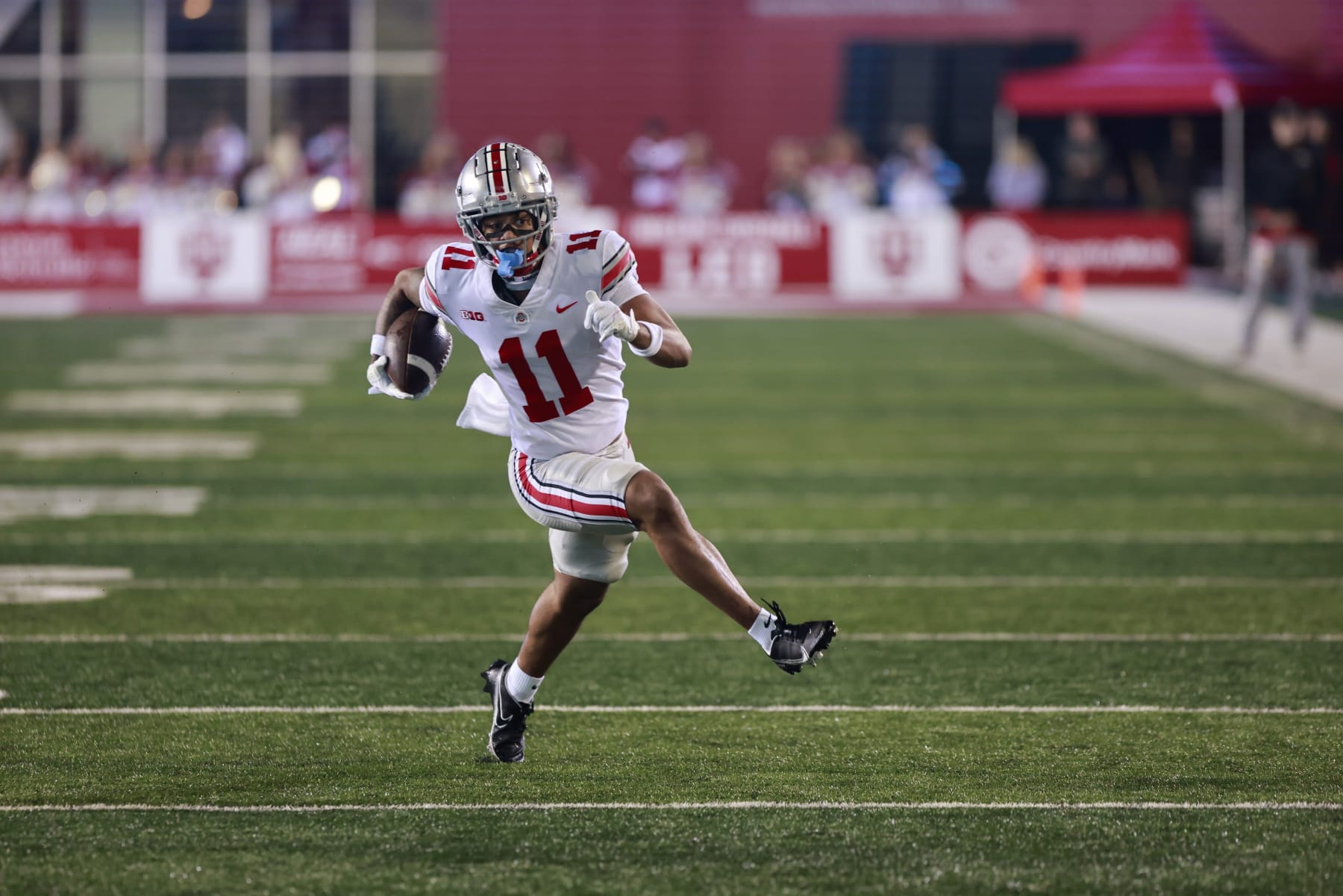 BLOOMINGTON, INDIANA, UNITED STATES - 2021/10/23: Ohio State Buckeyes wide receiver Jaxon Smith-Njigba (11) in action during the National Collegiate Athletic Association (NCAA) football game between Indiana University and Ohio State at Memorial Stadium.
Final score; Ohio State 54:7 Indiana University. (Photo by Jeremy Hogan/SOPA Images/LightRocket via Getty Images)