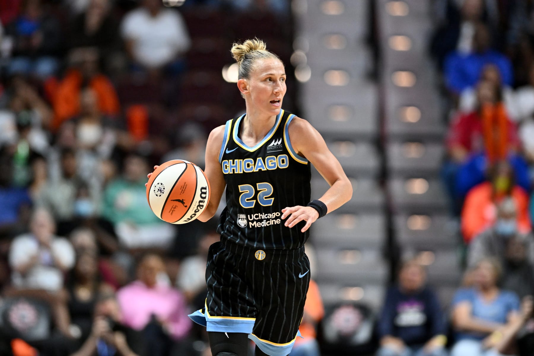 UNCASVILLE, CT - SEPTEMBER 6:  Courtney Vandersloot #22 of the Chicago Sky dribbles the ball during the game against the Connecticut Sun during Round 2 Game 4 of the 2022 WNBA Playoffs on September 6, 2022 at Mohegan Sun Arena in Uncasville, Connecticut.  NOTE TO USER: User expressly acknowledges and agrees that, by downloading and/or using this Photograph, user is consenting to the terms and conditions of the Getty Images License Agreement. Mandatory Copyright Notice: Copyright 2022 NBAE (Photo by Catalina Fragoso/NBAE via Getty Images)