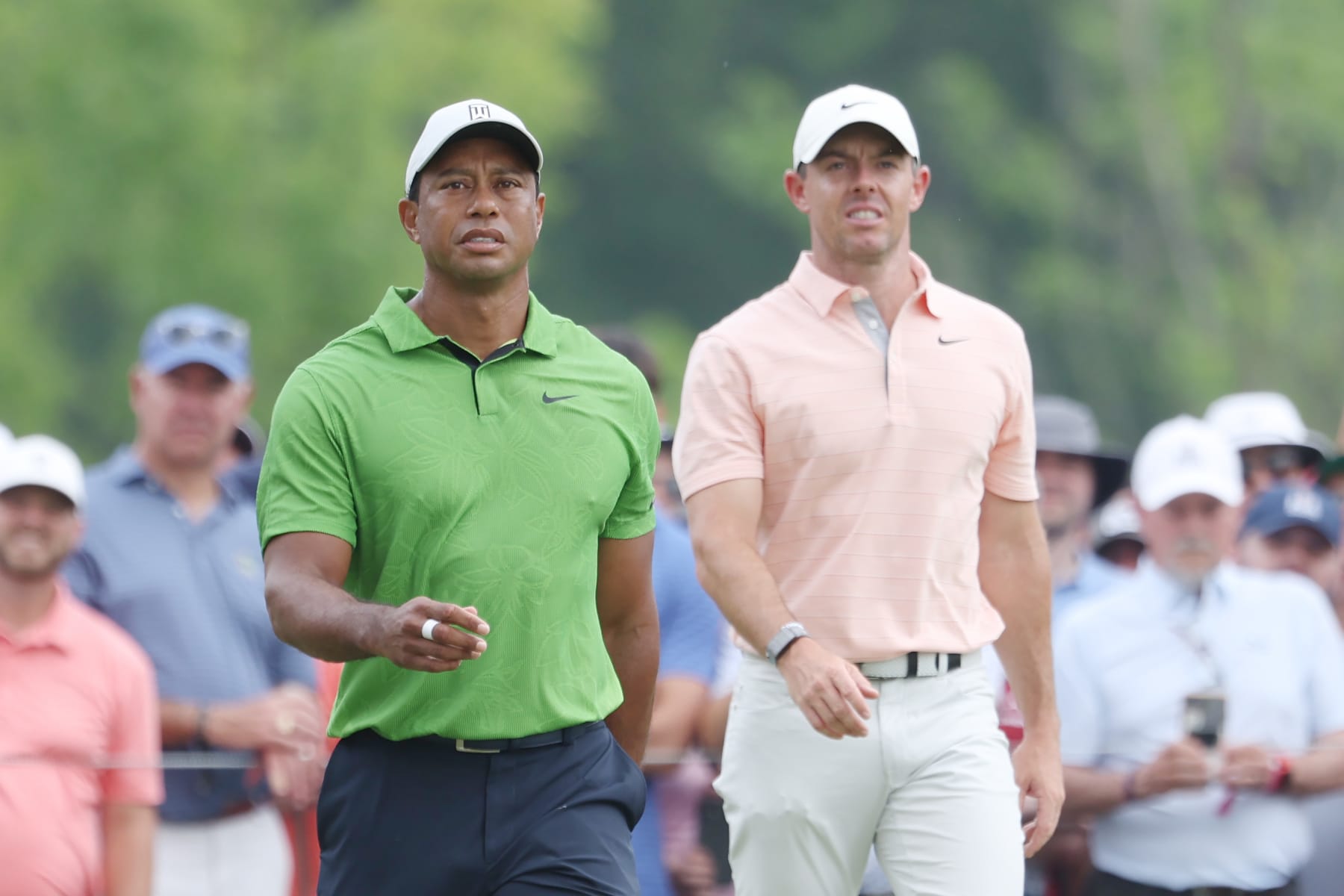 TULSA, OKLAHOMA - MAY 20: Tiger Woods of the United States talks with Rory McIlroy of Northern Ireland on the second hole during the second round of the 2022 PGA Championship at Southern Hills Country Club on May 20, 2022 in Tulsa, Oklahoma. (Photo by Maddie Meyer/PGA of America/PGA of America via Getty Images )