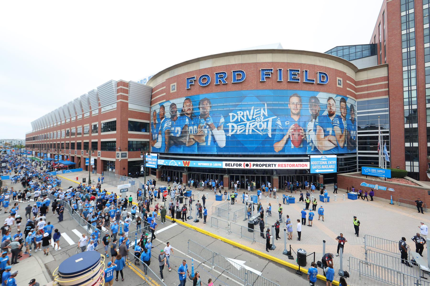 DETROIT, MICHIGAN - SEPTEMBER 11: A general view as fans walk outside Ford Field before the game between the Philadelphia Eagles and the Detroit Lions on September 11, 2022 in Detroit, Michigan. (Photo by Nic Antaya/Getty Images)