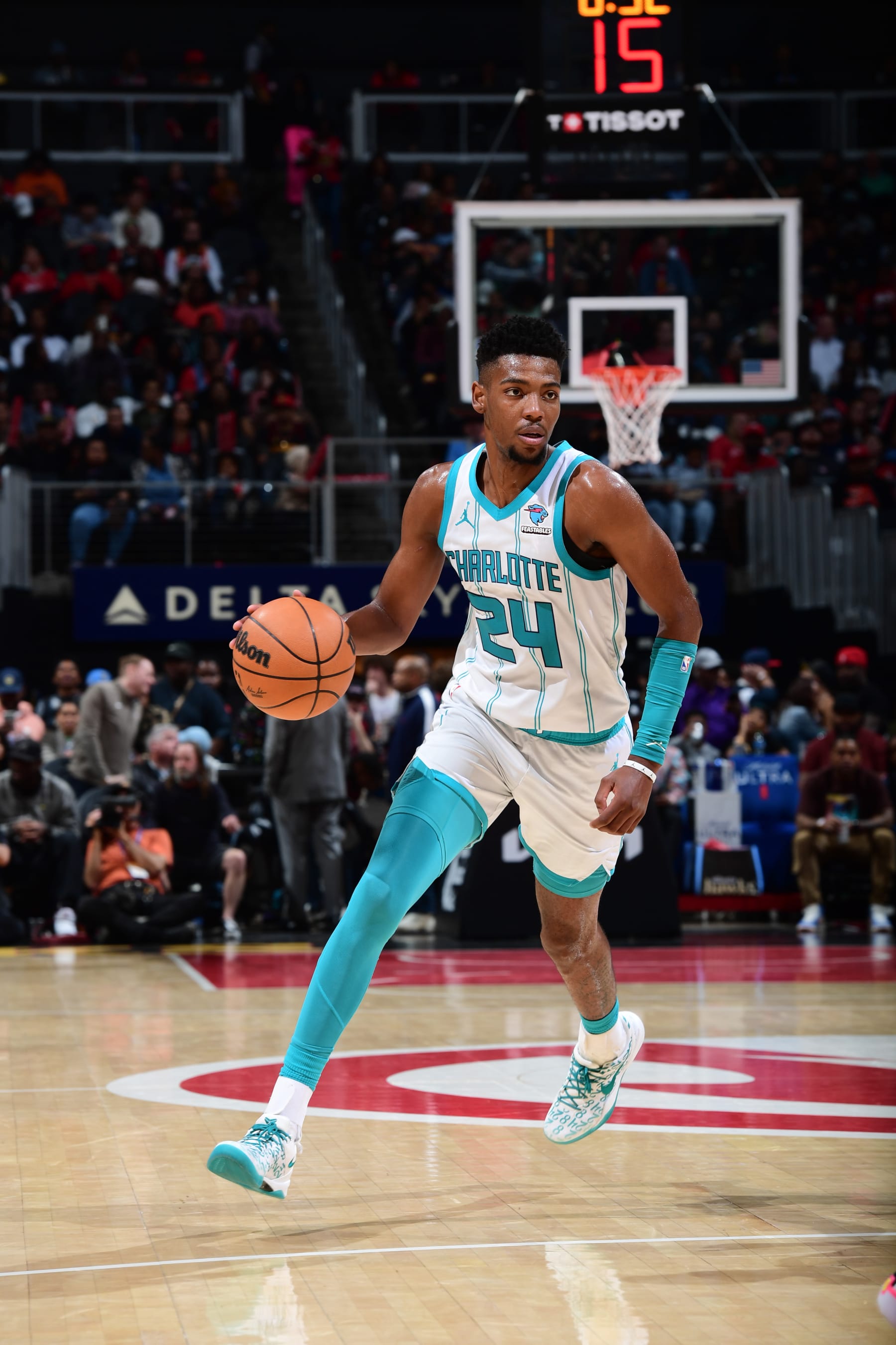 ATLANTA, GA - APRIL 10: Brandon Miller #24 of the Charlotte Hornets dribbles the ball during the game against the Atlanta Hawks on April 10, 2024 at State Farm Arena in Atlanta, Georgia.  NOTE TO USER: User expressly acknowledges and agrees that, by downloading and/or using this Photograph, user is consenting to the terms and conditions of the Getty Images License Agreement. Mandatory Copyright Notice: Copyright 2024 NBAE (Photo by Scott Cunningham/NBAE via Getty Images)