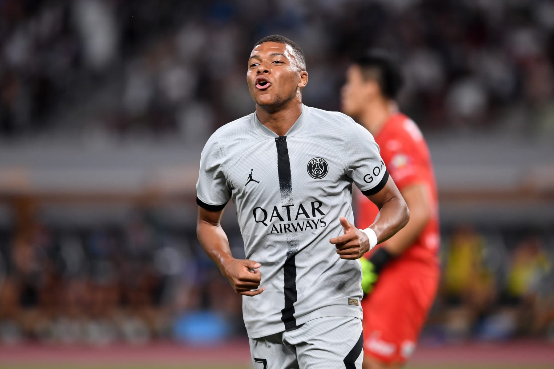 TOKYO, JAPAN - JULY 20: Kylian Mbappe of Paris Sait-Germain reacts during the preseason friendly match between Paris Saint-Germain and Kawasaki Frontale at National Stadium on July 20, 2022 in Tokyo, Japan. (Photo by Masashi Hara/Getty Images)