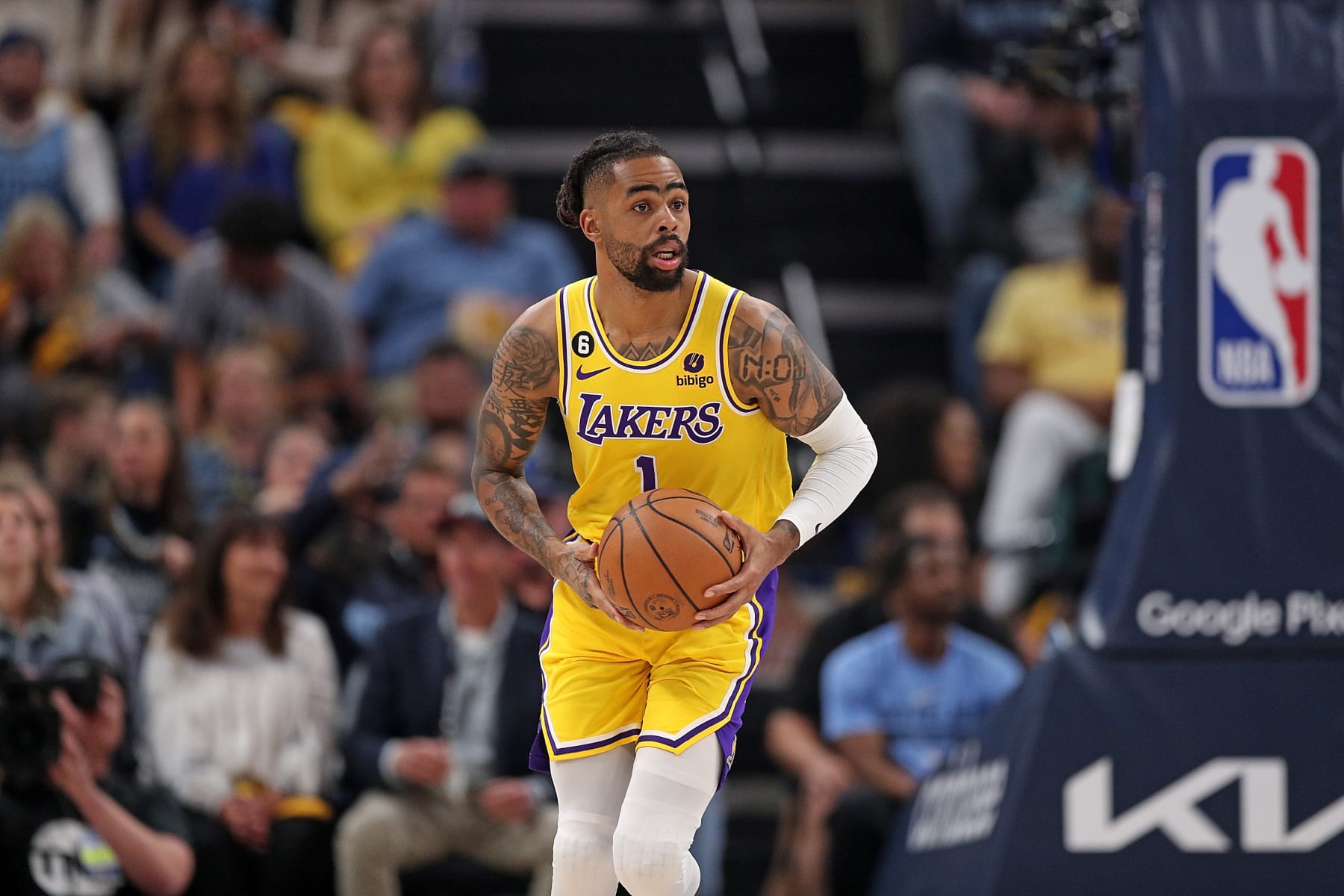 MEMPHIS, TENNESSEE - APRIL 26: D'Angelo Russell #1 of the Los Angeles Lakers brings the ball upcourt against the Memphis Grizzlies during Game Five of the Western Conference First Round Playoffs at FedExForum on April 26, 2023 in Memphis, Tennessee. NOTE TO USER: User expressly acknowledges and agrees that, by downloading and or using this photograph, User is consenting to the terms and conditions of the Getty Images License Agreement. (Photo by Justin Ford/Getty Images)
