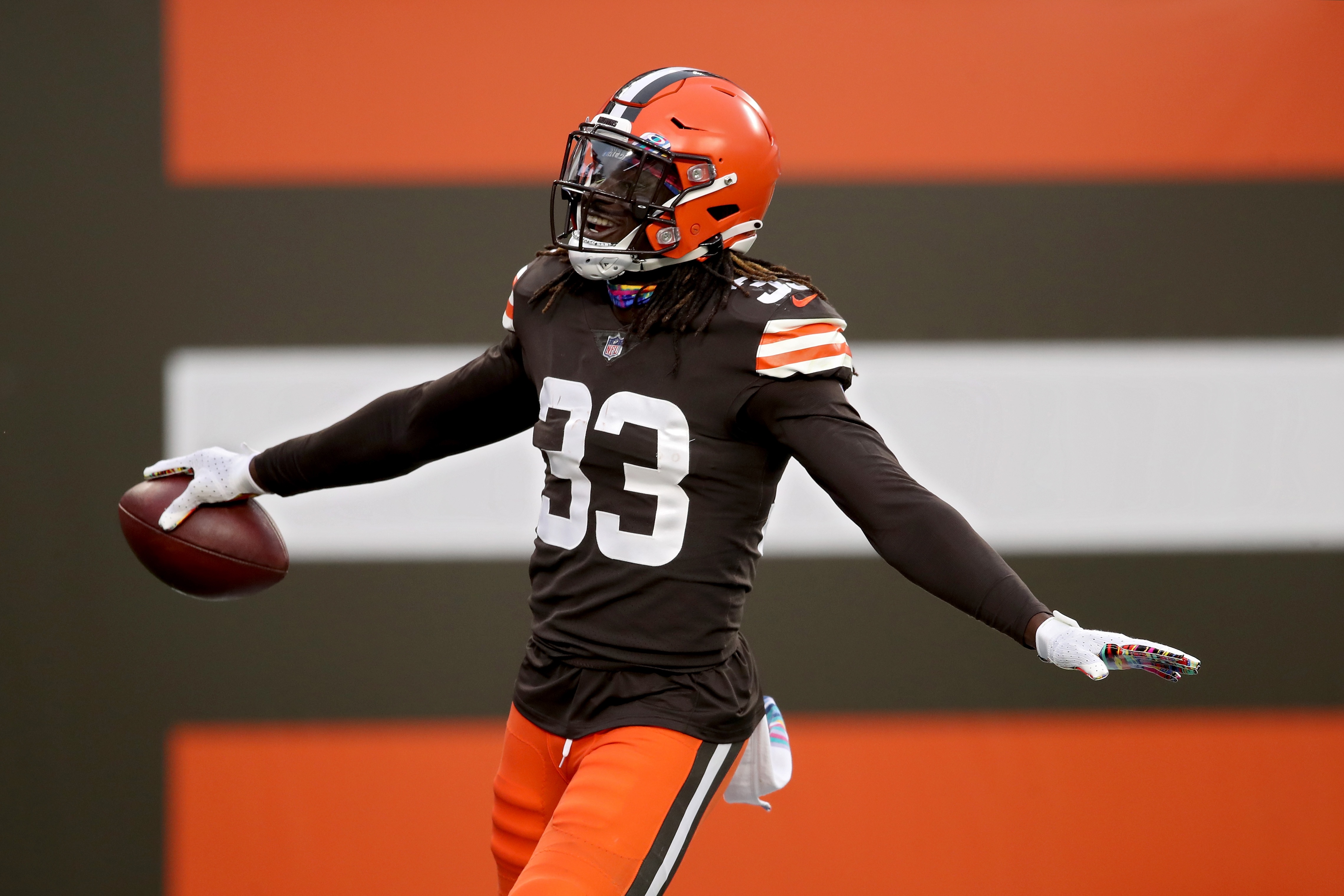 CLEVELAND, OHIO - OCTOBER 11: Ronnie Harrison Jr. #33 of the Cleveland Browns celebrates after scoring a touchdown from an interception in the third quarter against the Indianapolis Colts at FirstEnergy Stadium on October 11, 2020 in Cleveland, Ohio. (Photo by Gregory Shamus/Getty Images)