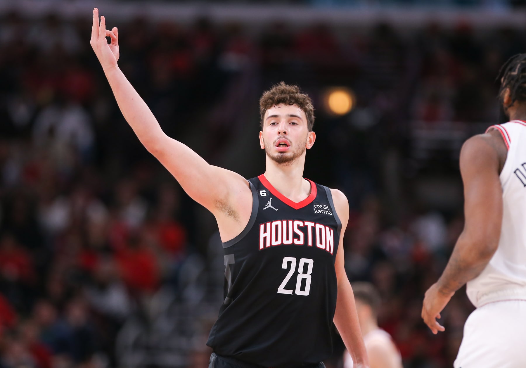 CHICAGO, IL - DECEMBER 26: Houston Rockets Center Alperen Sengun (28) reacts after making a three point basket during a NBA game between the Houston Rockets and the Chicago Bulls on December  26, 2022 at the United Center in Chicago, IL. (Photo by Melissa Tamez/Icon Sportswire via Getty Images)