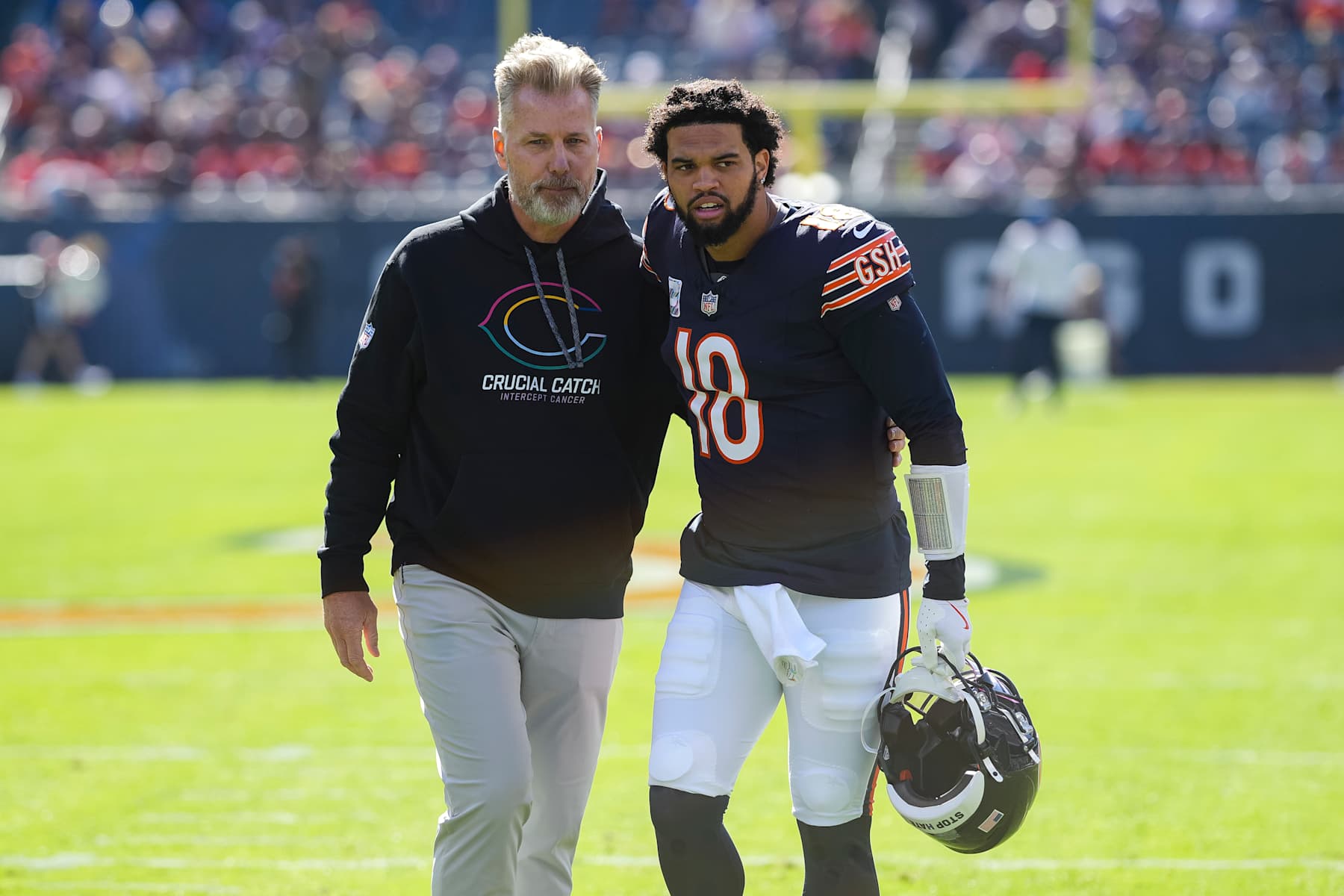 CHICAGO, ILLINOIS - OCTOBER 6: Head coach Matt Eberflus of the Chicago Bears stands on the field with quarterback Caleb Williams #18 prior to an NFL football game against the Carolina Panthers, at Soldier Field on October 6, 2024 in Chicago, Illinois. (Photo by Todd Rosenberg/Getty Images)