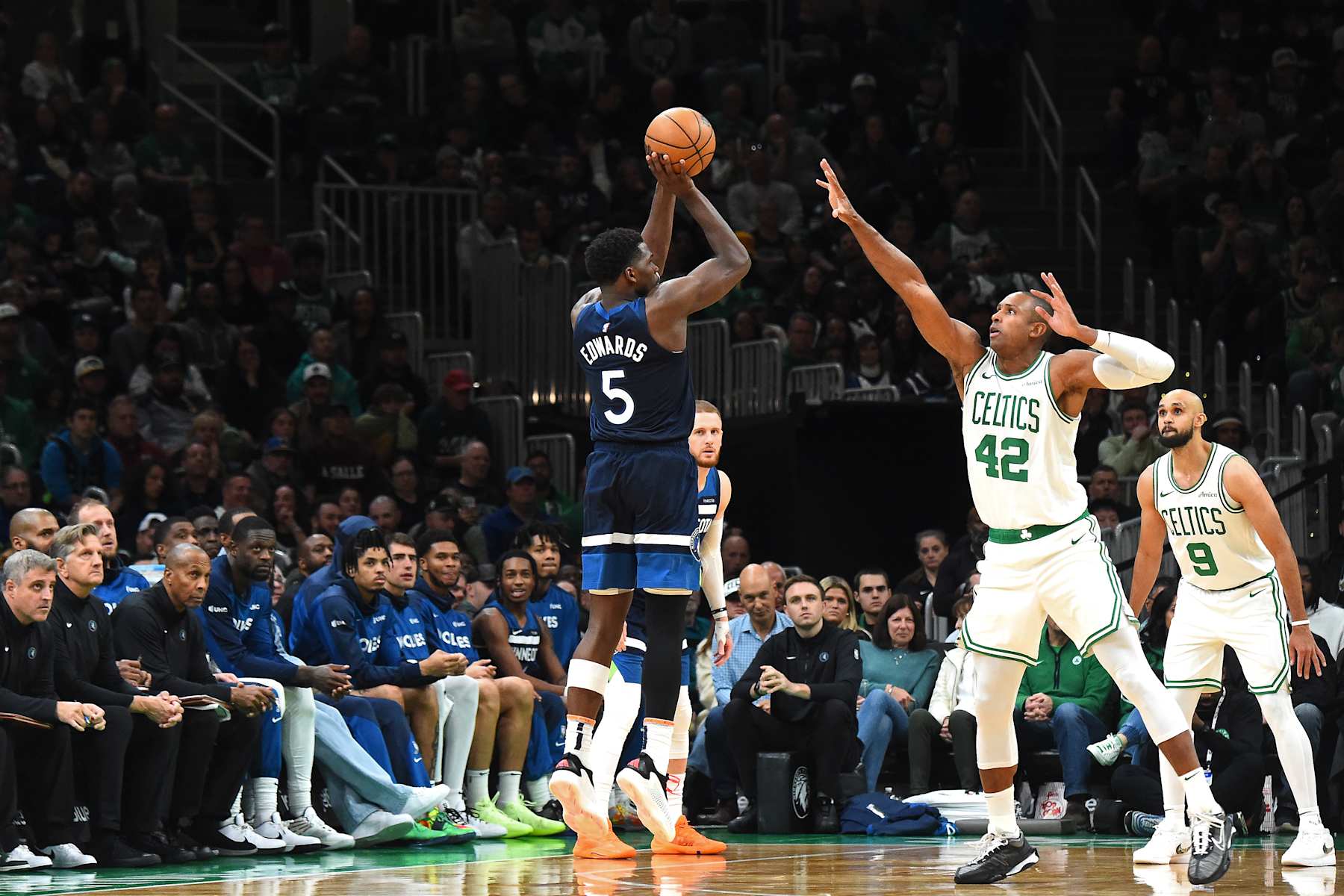 BOSTON, MA - NOVEMBER 24: Anthony Edwards #5 of the Minnesota Timberwolves three point basket during the game against the Boston Celtics on November 24, 2024 at the TD Garden in Boston, Massachusetts. NOTE TO USER: User expressly acknowledges and agrees that, by downloading and or using this photograph, User is consenting to the terms and conditions of the Getty Images License Agreement. Mandatory Copyright Notice: Copyright 2024 NBAE(Photo by Brian Babineau/NBAE via Getty Images)