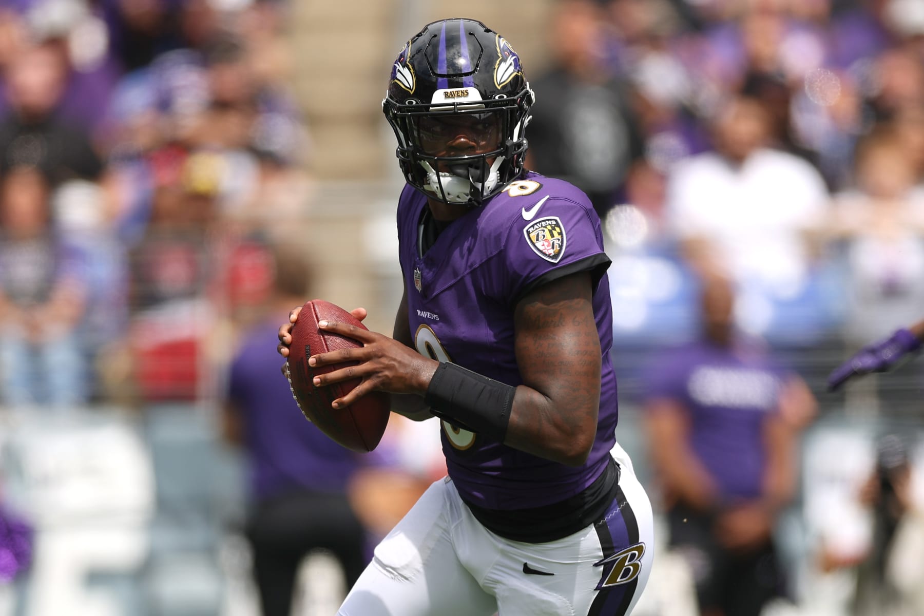 BALTIMORE, MARYLAND - SEPTEMBER 10:  Lamar Jackson #8 of the Baltimore Ravens attempts a pass against the Houston Texans during the first half at M&T Bank Stadium on September 10, 2023 in Baltimore, Maryland. (Photo by Patrick Smith/Getty Images)