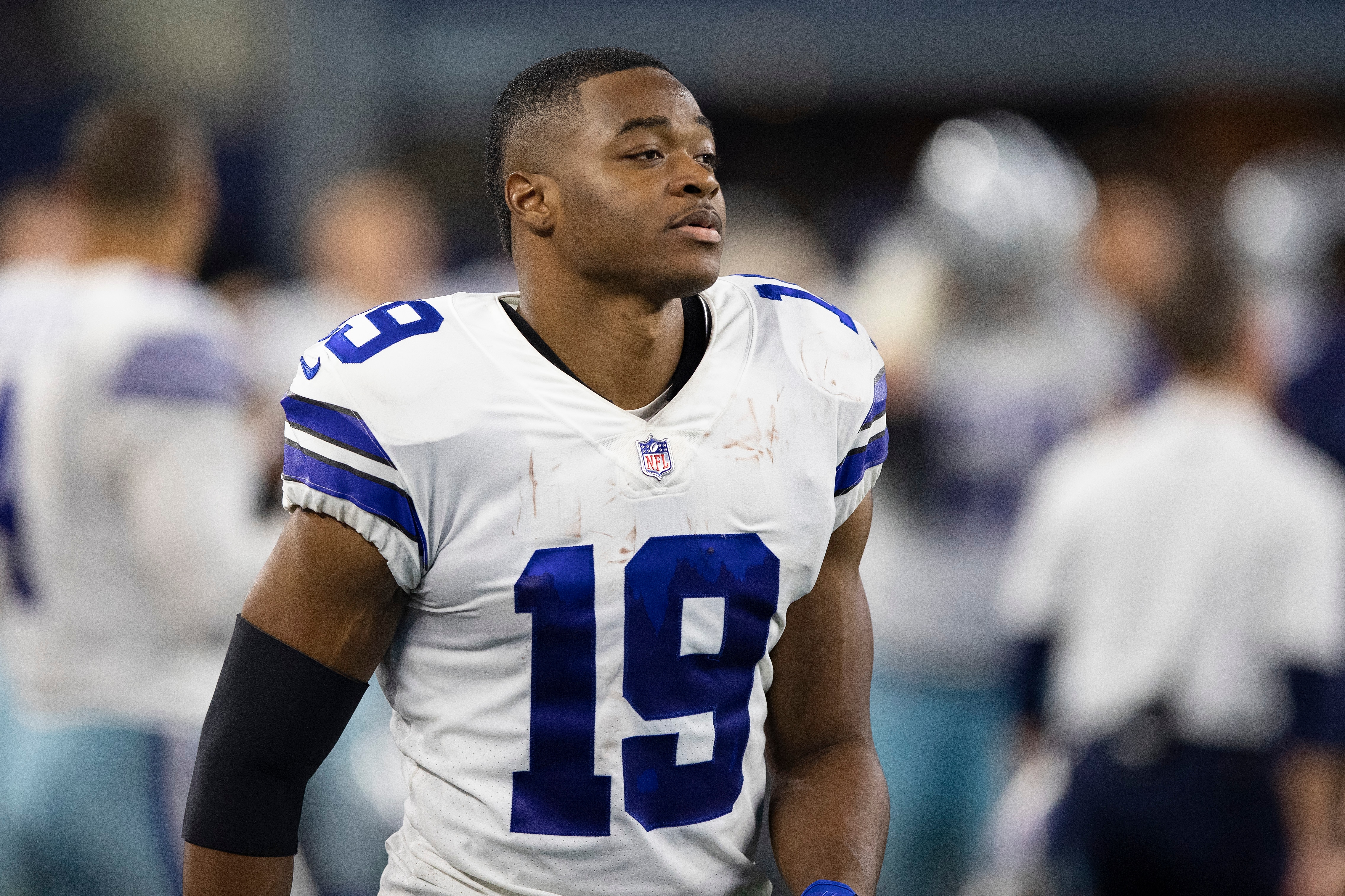 ARLINGTON, TEXAS - DECEMBER 26:  Amari Cooper #19 of the Dallas Cowboys on the sidelines during a game against the Washington Football Team at AT&T Stadium on December 26, 2021 in Arlington, Texas.  The Cowboys defeated the Football Team 56-14.  (Photo by Wesley Hitt/Getty Images)