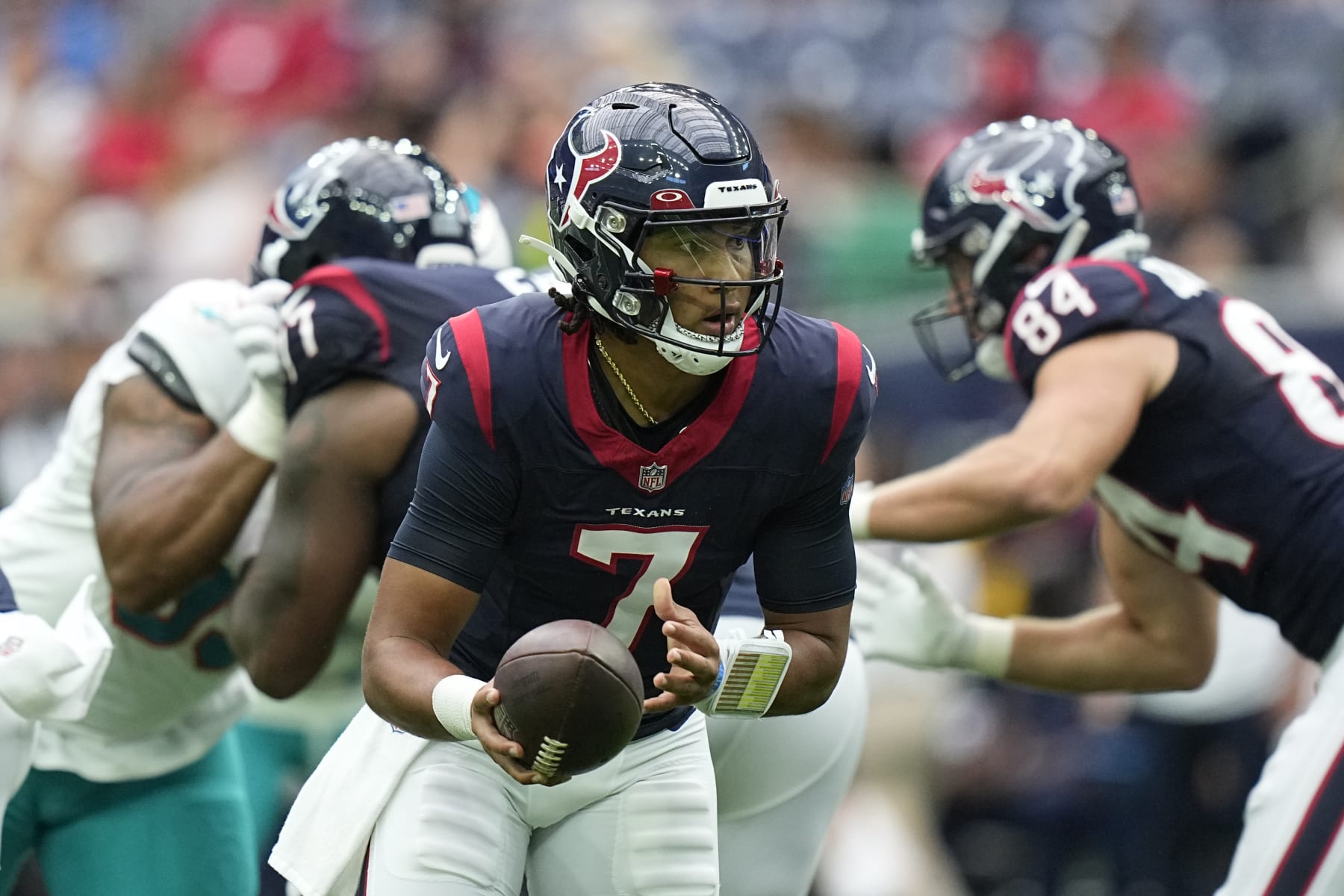 Houston Texans quarterback C.J. Stroud prepares to hand off the ball against the Miami Dolphins during the first half of an NFL preseason football game, Saturday, Aug. 19, 2023, in Houston. (AP Photo/Eric Gay)