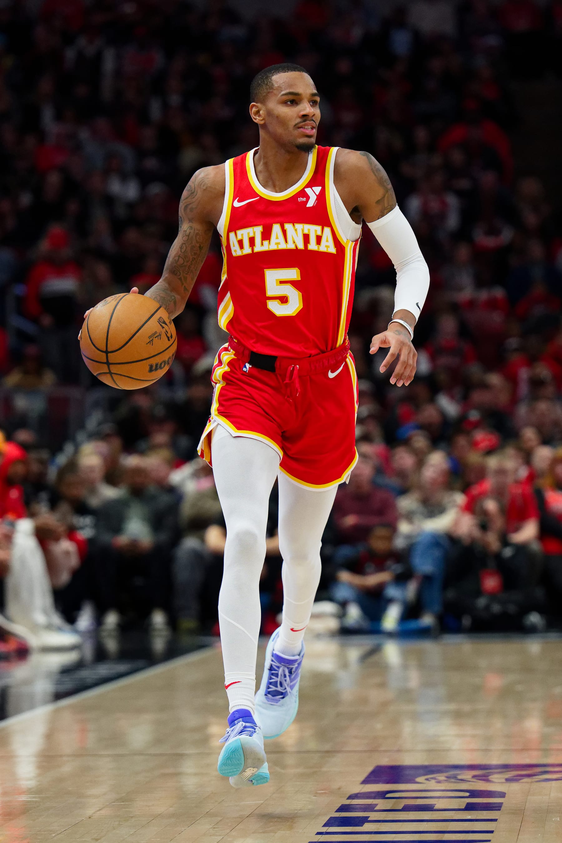 CHICAGO, ILLINOIS - DECEMBER 26: Dejounte Murray #5 of the Atlanta Hawks controls the ball against the Chicago Bulls on December 26, 2023 at United Center in Chicago, Illinois. NOTE TO USER: User expressly acknowledges and agrees that, by downloading and or using this photograph, User is consenting to the terms and conditions of the Getty Images License Agreement. (Photo by Jamie Sabau/Getty Images) CHICAGO, ILLINOIS - DECEMBER 26: Dejounte Murray #5 of the Atlanta Hawks controls the ball against the Chicago Bulls on December 26, 2023 at United Center in Chicago, Illinois. NOTE TO USER: User expressly acknowledges and agrees that, by downloading and or using this photograph, User is consenting to the terms and conditions of the Getty Images License Agreement. (Photo by Jamie Sabau/Getty Images)