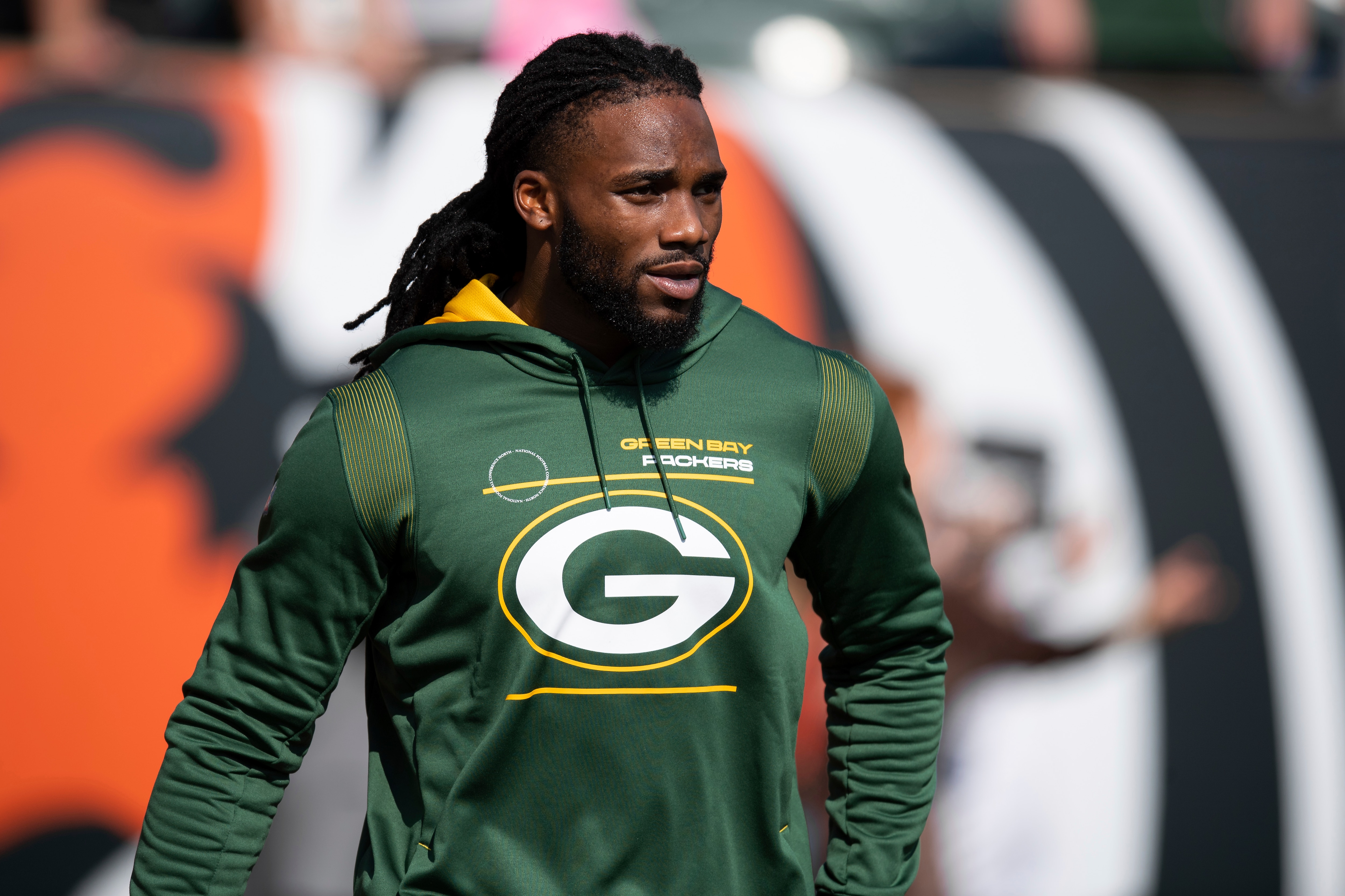 Green Bay Packers linebacker Jaylon Smith (9) warms up on the field before an NFL football game against the Cincinnati Bengals, Sunday, Oct. 10, 2021, in Cincinnati. (AP Photo/Zach Bolinger)