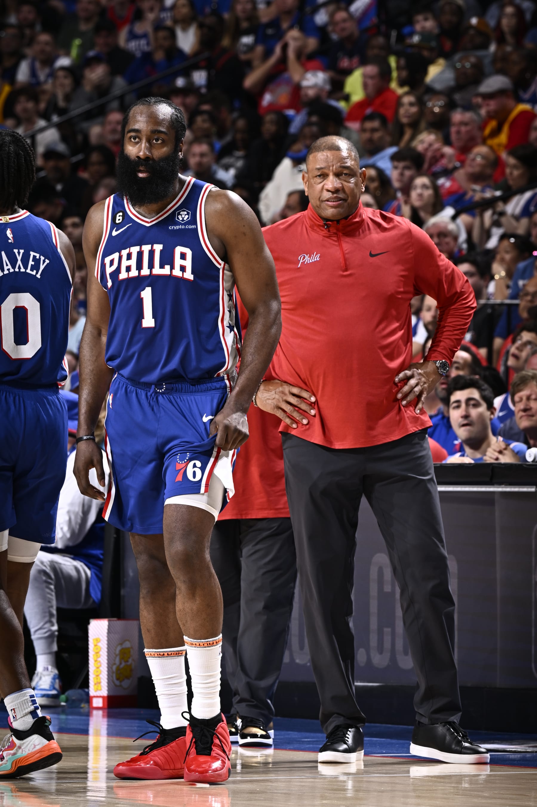 PHILADELPHIA, PA - MAY 7: James Harden #1 of the Philadelphia 76ers & Head Coach Doc Rivers of the Philadelphia 76ers looks on during the game during round two game four of the 2023 NBA Playoffs on on May 7, 2023 at the Wells Fargo Center in Philadelphia, Pennsylvania NOTE TO USER: User expressly acknowledges and agrees that, by downloading and/or using this Photograph, user is consenting to the terms and conditions of the Getty Images License Agreement. Mandatory Copyright Notice: Copyright 2023 NBAE (Photo by David Dow/NBAE via Getty Images)