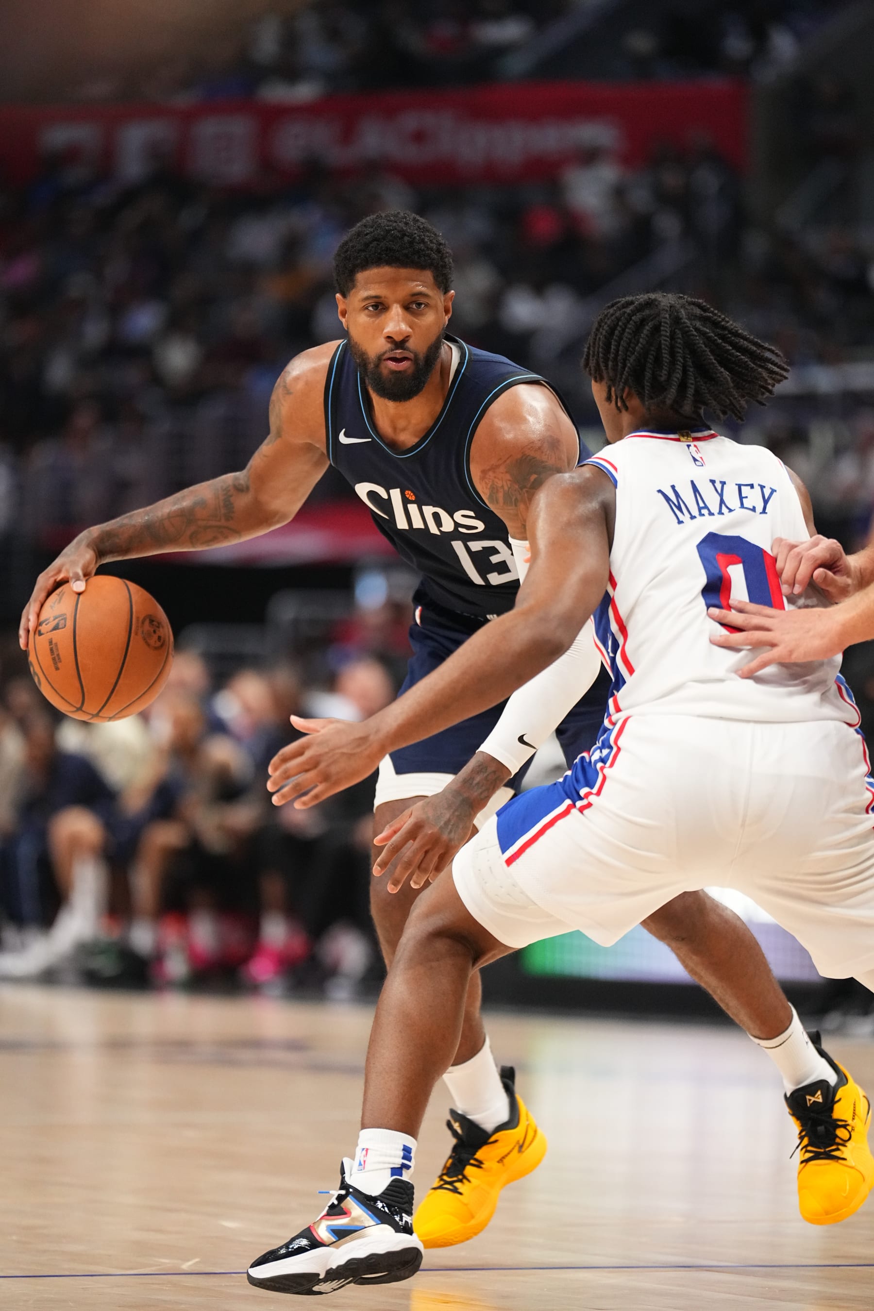 LOS ANGELES, CA - MARCH 24: Paul George #13 of the LA Clippers dribbles the ball during the game against the Philadelphia 76ers on March 24, 2024 at Crypto.Com Arena in Los Angeles, California. NOTE TO USER: User expressly acknowledges and agrees that, by downloading and/or using this Photograph, user is consenting to the terms and conditions of the Getty Images License Agreement. Mandatory Copyright Notice: Copyright 2024 NBAE (Photo by Garrett Ellwood/NBAE via Getty Images)