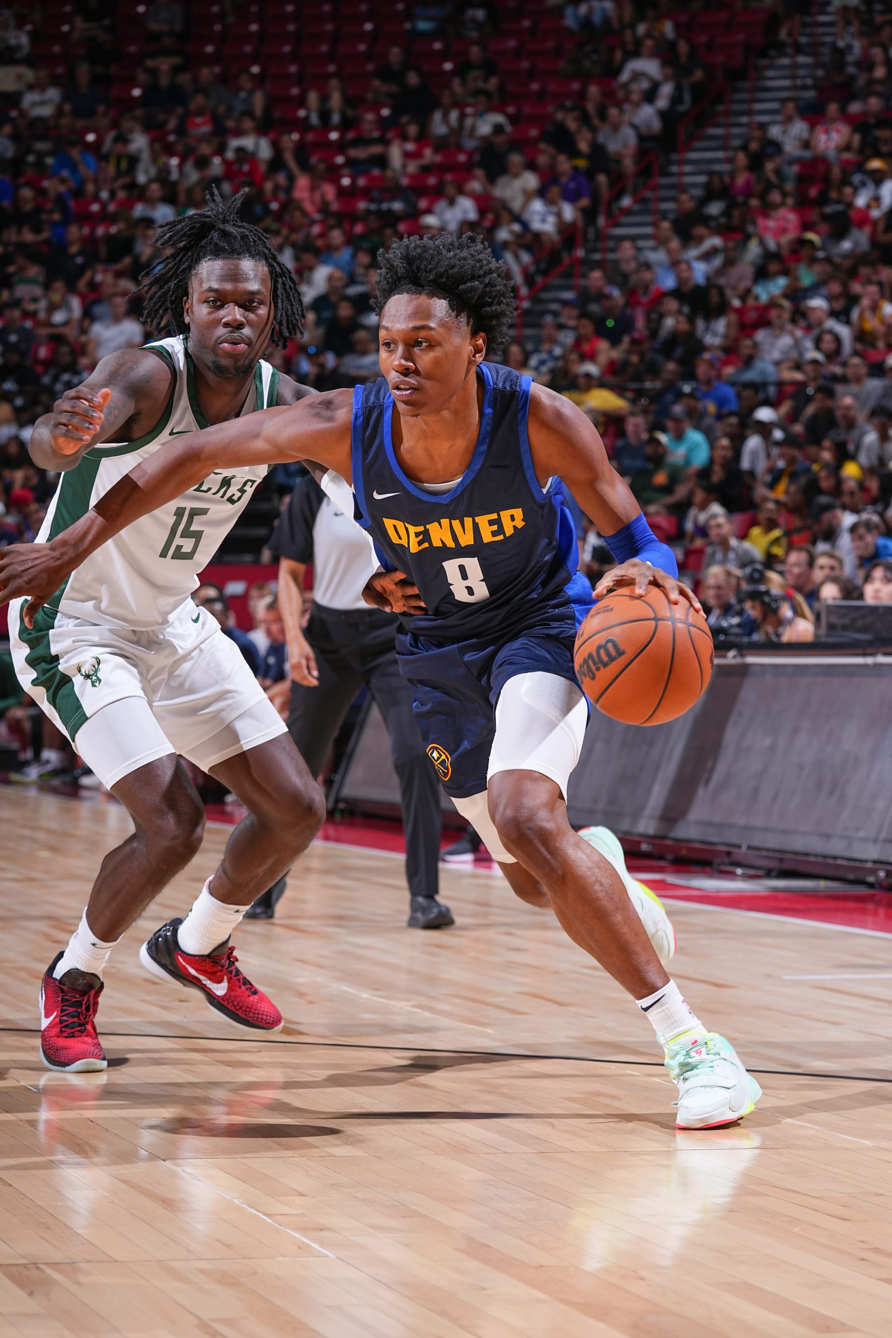LAS VEGAS, NV - JULY 7:  Peyton Watson #8 of the Denver Nuggets goes to the basket during the game during the 2023 NBA Las Vegas Summer League on July 7, 2023 at the Thomas & Mack Center in Las Vegas, Nevada. NOTE TO USER: User expressly acknowledges and agrees that, by downloading and or using this Photograph, User is consenting to the terms and conditions of the Getty Images License Agreement. Mandatory Copyright Notice: Copyright 2023 NBAE (Photo by Bart Young/NBAE via Getty Images)
