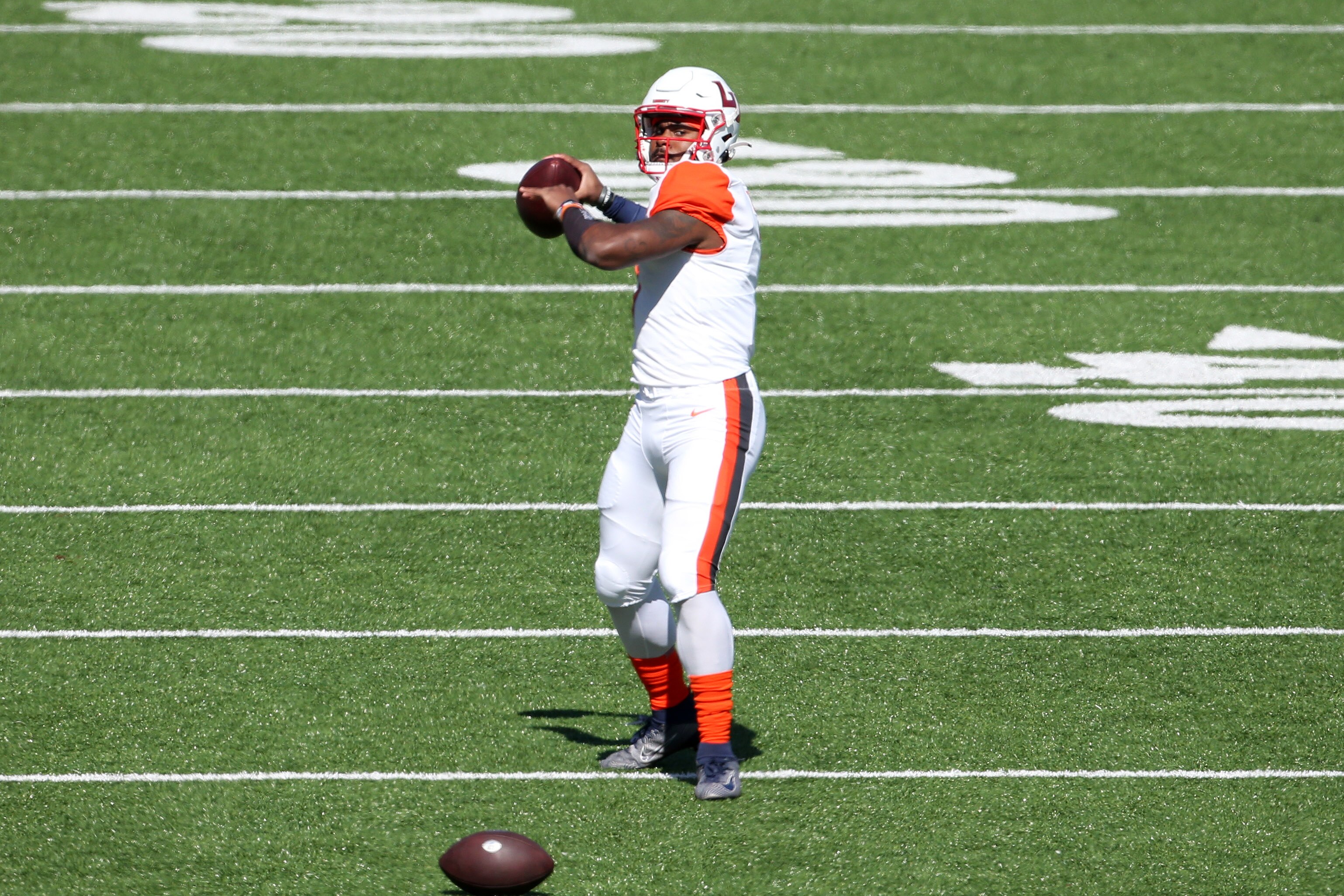 MOBILE, AL - FEBRUARY 05: American quarterback Malik Willis of Liberty (7) warms up for the Reese's Senior Bowl on February 5, 2022 at Hancock Whitney Stadium in Mobile, Alabama.  (Photo by Michael Wade/Icon Sportswire via Getty Images)