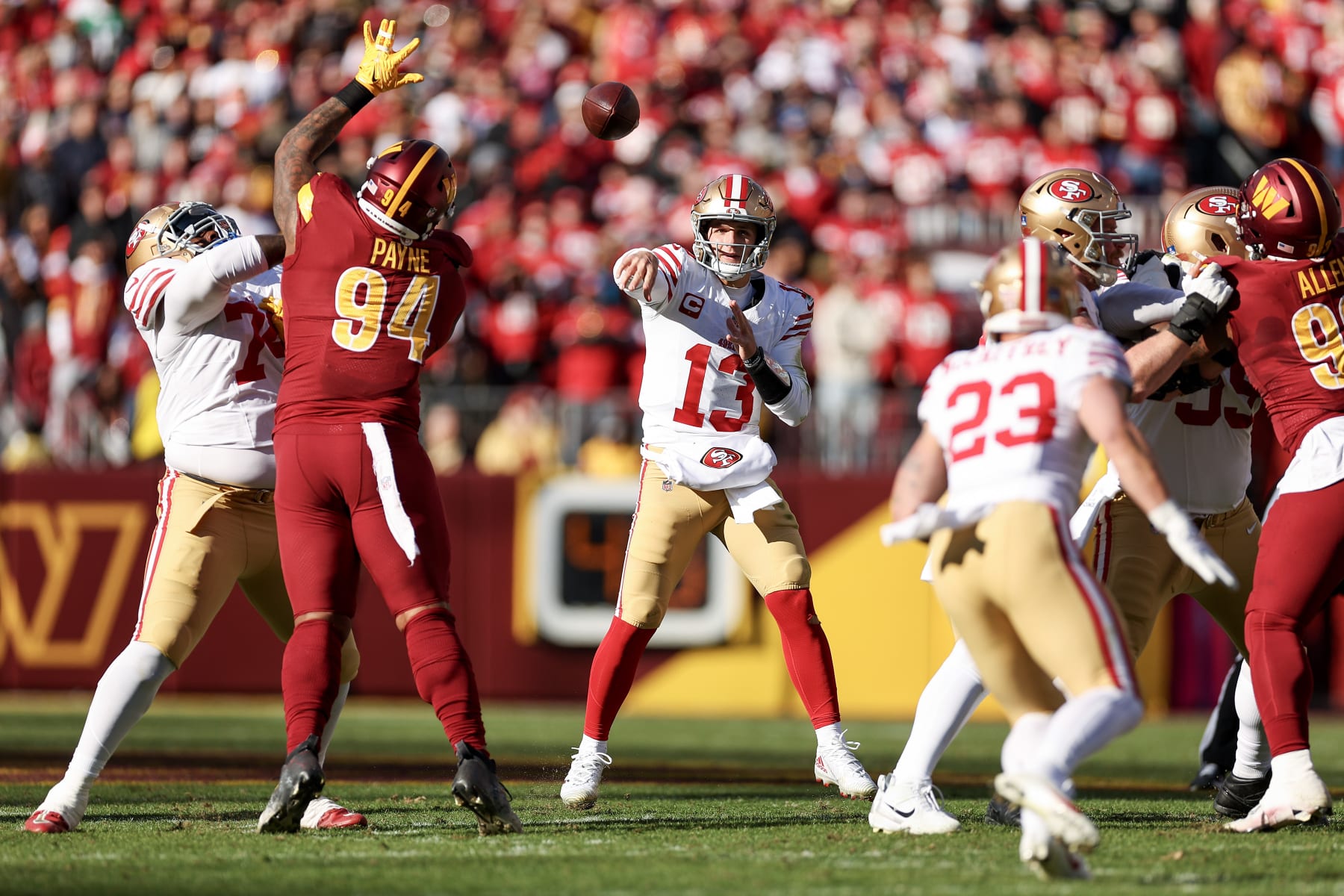 LANDOVER, MARYLAND - DECEMBER 31: Brock Purdy #13 of the San Francisco 49ers throws a pass during the first quarter of a game against the Washington Commanders at FedExField on December 31, 2023 in Landover, Maryland. (Photo by Scott Taetsch/Getty Images)