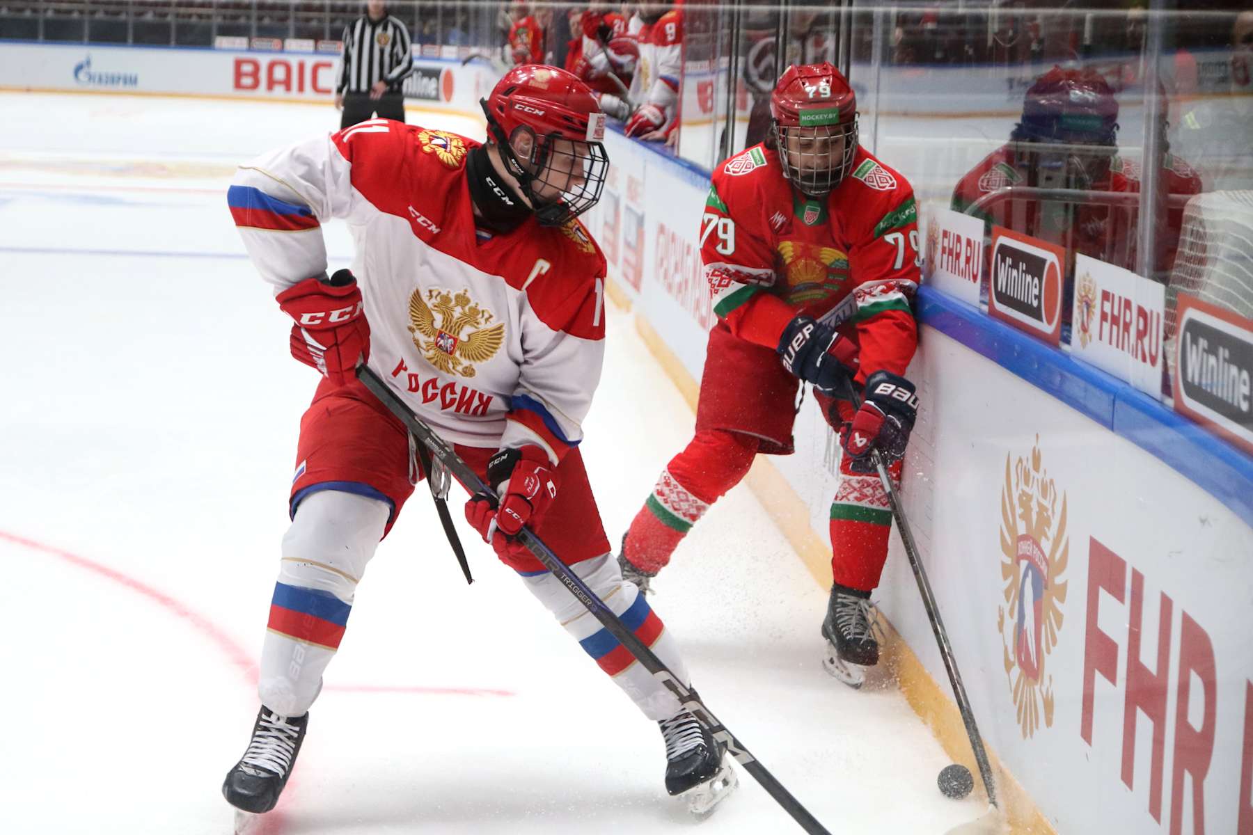 SAINT PETERSBURG, RUSSIA - 2024/11/08: Ivan Ryabkin (11) Russia U18 and Timofey Mamanovich (79) of Belarus Hockey team seen in action during the Hockey match, Future Cup between Belarus U20 and Russia U18 at the Jubilee Sports Complex. (Final score; Russia U18 1:2 Belarus U20). (Photo by Maksim Konstantinov/SOPA Images/LightRocket via Getty Images)
